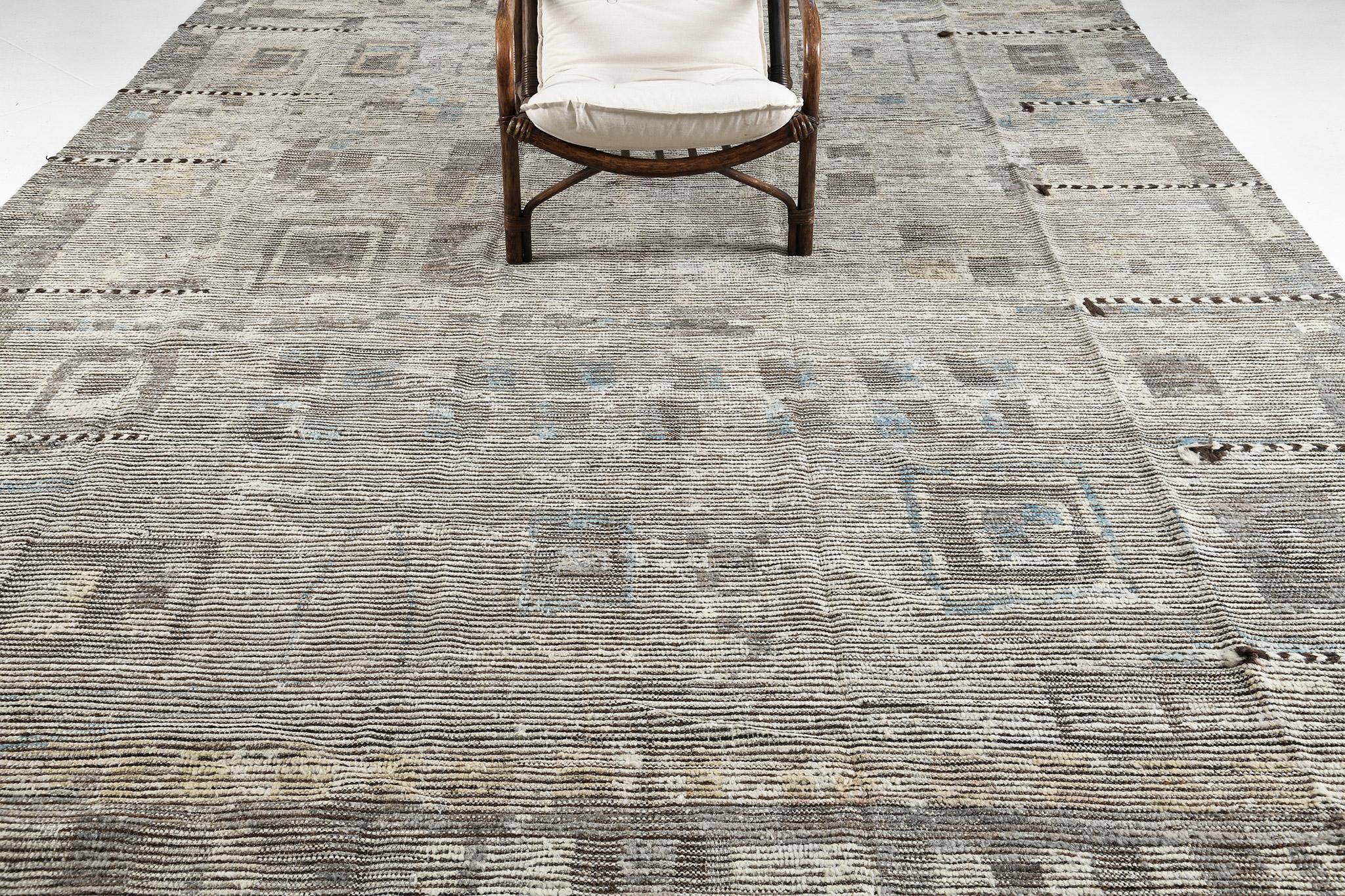 Characterized by playful ambiguous elements, Awsim’ displays beautiful earthy shades that bring out its fascinating aesthetic appeal. The depth and meaning presented on this wonderful rug makes one a perfect addition to contemporary interiors.