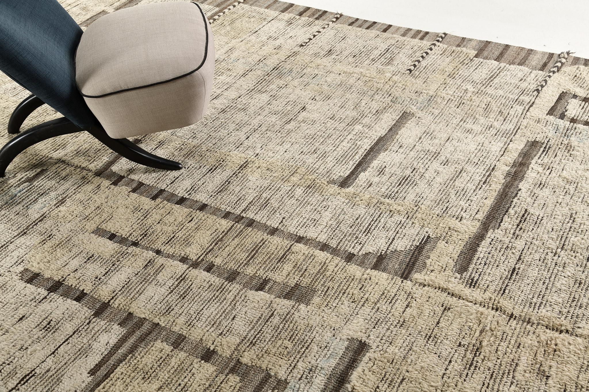 Aziza is a warm and lustrous wool rug with a unique play of colors and irregular shapes. This pile weave has natural-toned embossed textures and unique tassel detailing which makes this piece highly sought after. Mehraban's Atlas collection is noted
