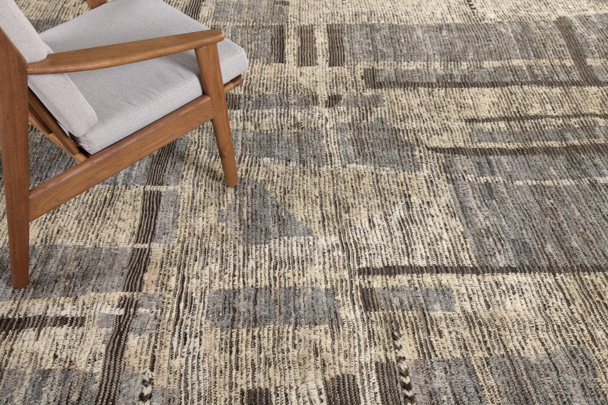 Aziza is a warm and lustrous wool rug with a unique play of colors and irregular shapes. This pile weave has natural-toned embossed textures and unique tassel detailing which makes this piece highly sought after. Mehraban's Atlas collection is noted