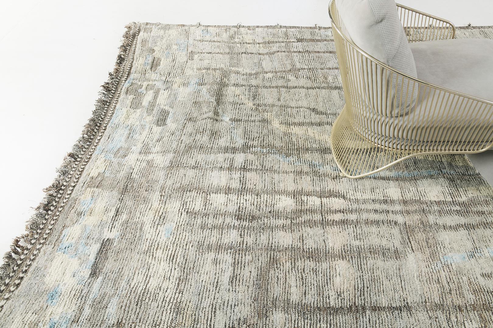 Berberis' is an interplay between natural earth tones and a burst of cool colours into a modern day interpretation of the Moroccan world. This rug's play of textures, linework, and unique shapes is what makes the Atlas Collection so unique and