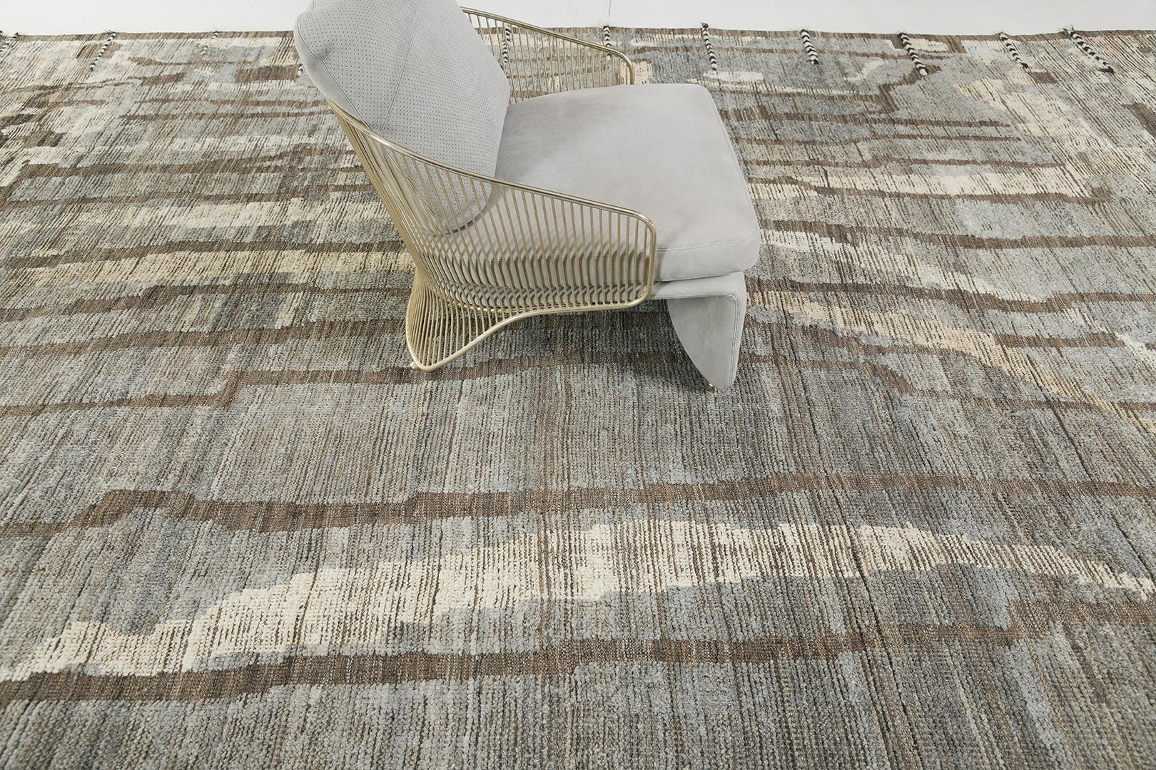 Berberis' is an interplay between natural earth tones and relaxing muted colours into a modern day interpretation of the Moroccan world. This rug's play of textures, linework, and unique shapes is what makes the Atlas Collection so unique and sought
