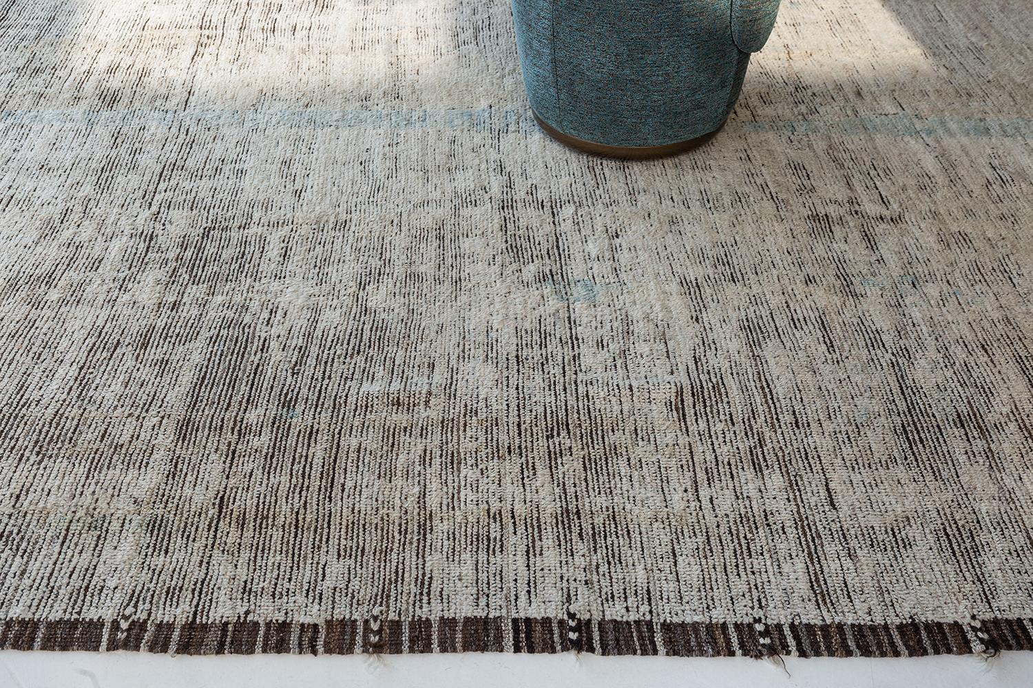 Berberis is an interplay between neutral tones and soothing muted colors into a modern-day interpretation of the Moroccan world. This rug's play of textures, linework, and simplicity is what makes the Atlas Collection so unique and sought after.