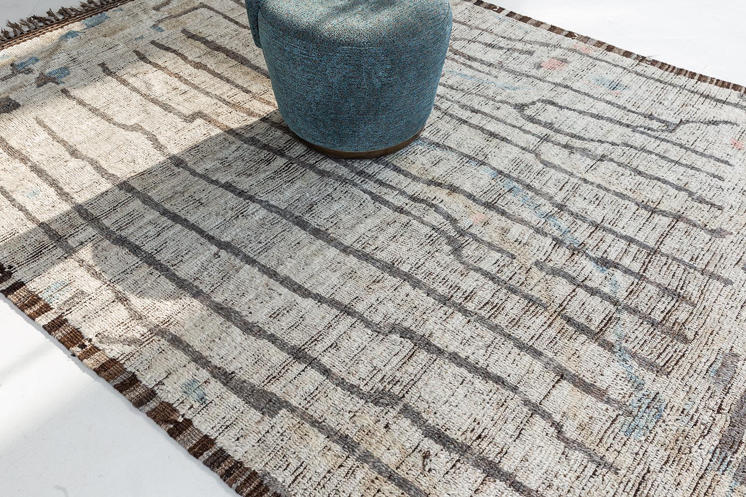 Berberis is an interplay between neutral tones and soothing muted colors into a modern-day interpretation of the Moroccan world. This rug's play of textures, linework, and unique shapes is what makes the Atlas Collection so unique and sought after.