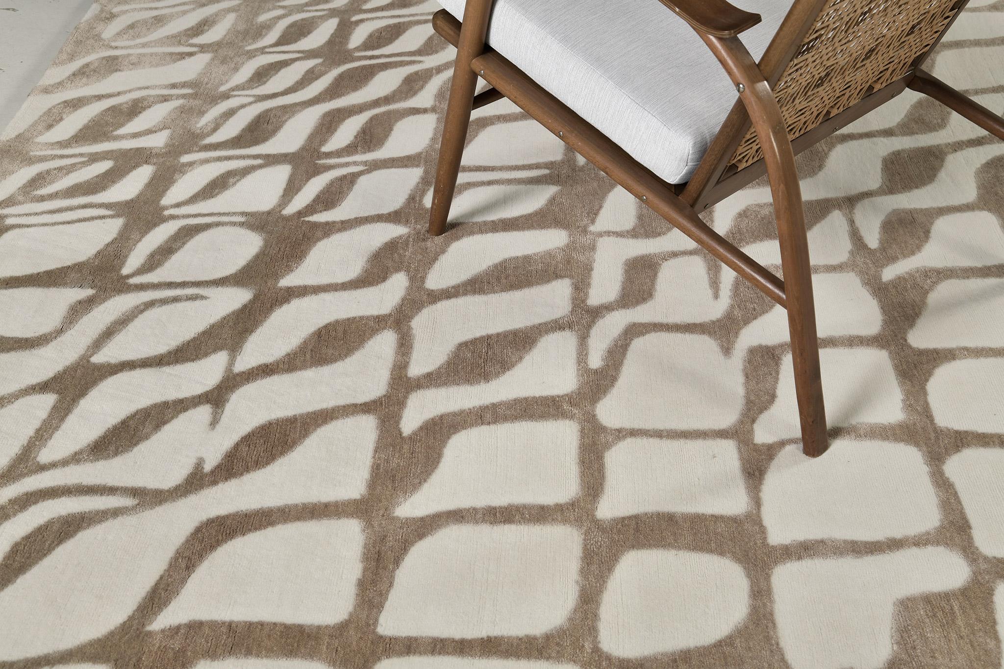 Calacatta is a neutral-toned elegant wool and silk embossed rug. A part of the Design Rhymes Collection which pulls inspiration from various aspects of architecture. Calacatta has been a darling in California amongst interior designers and