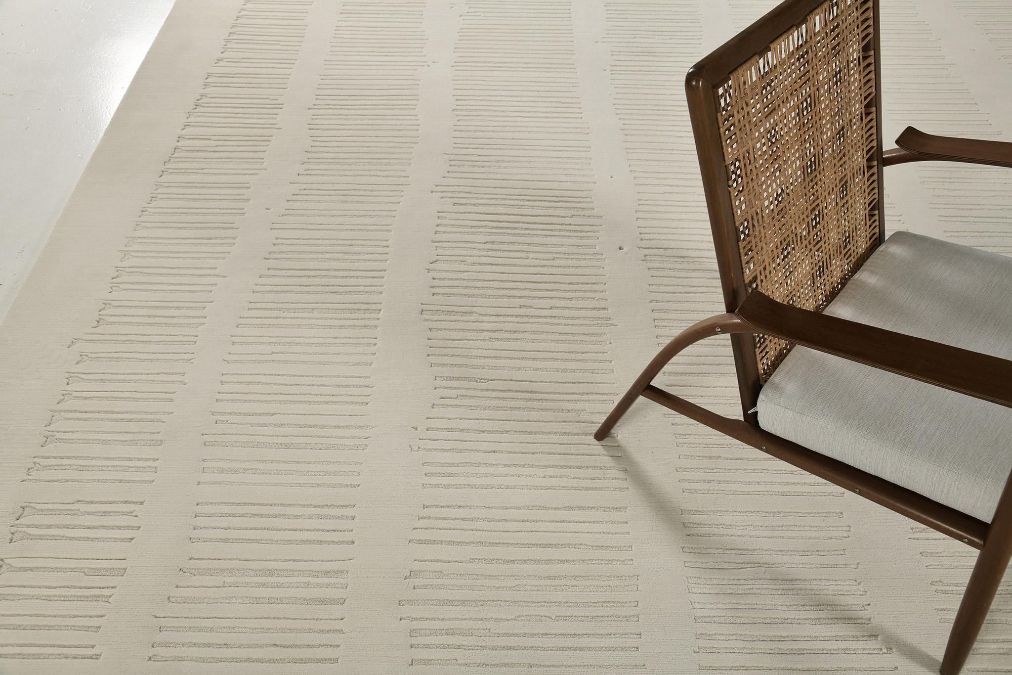 Camino has luxurious embossed linear strokes made from wool and silk woven elegantly. The plainness and simplicity of this rug will captivate your guest's heart. Modern contemporary will be a perfect choice for your theme that gives focus to your