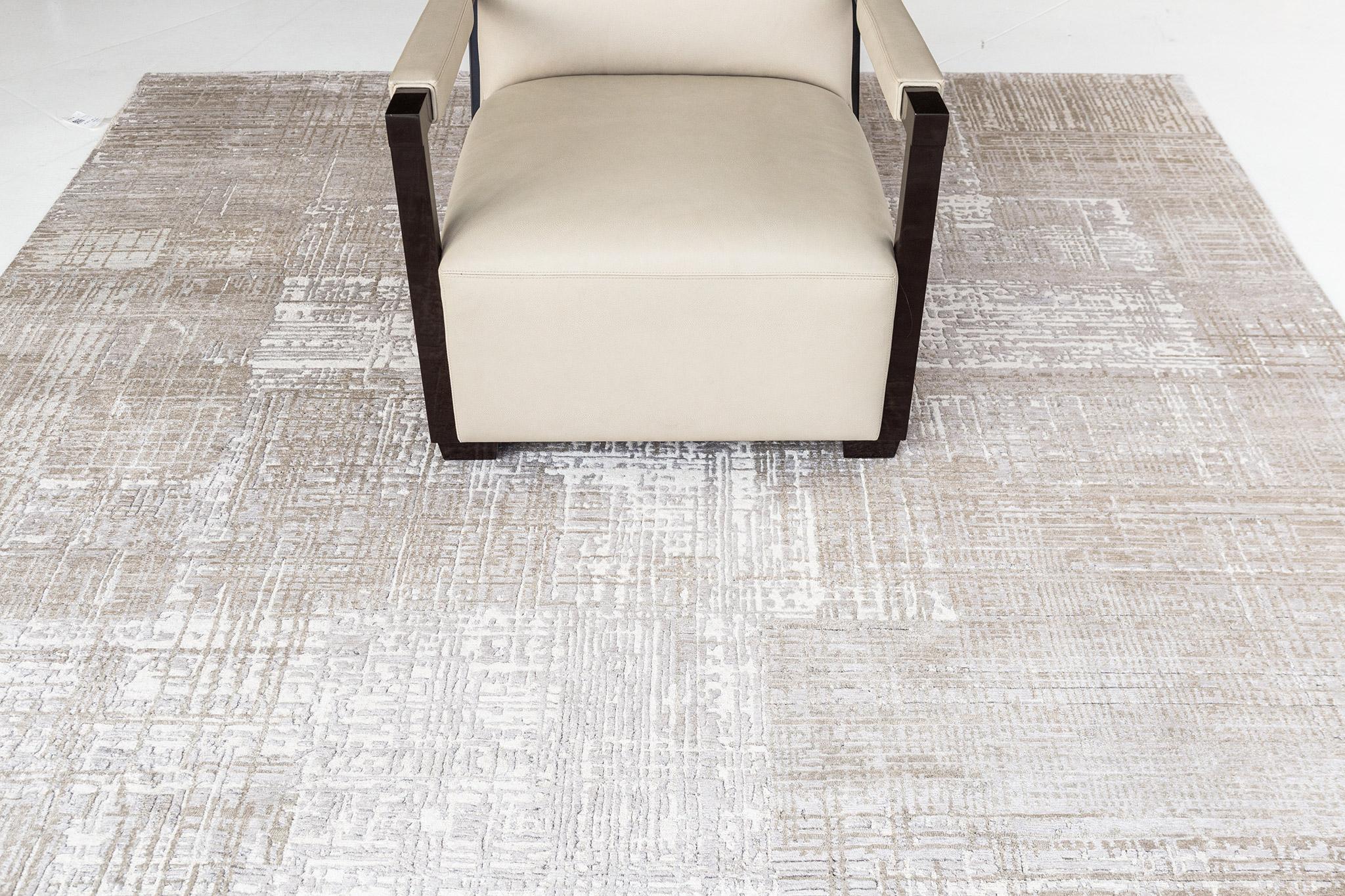 Casri is a bamboo silk rug with horizontal and vertical strokes in deep gradations of charcoal, ivory, and cream. Its handwoven wool features a series of free-spirited rugs that feels innately soft underfoot and is enhanced by extraordinary, valiant