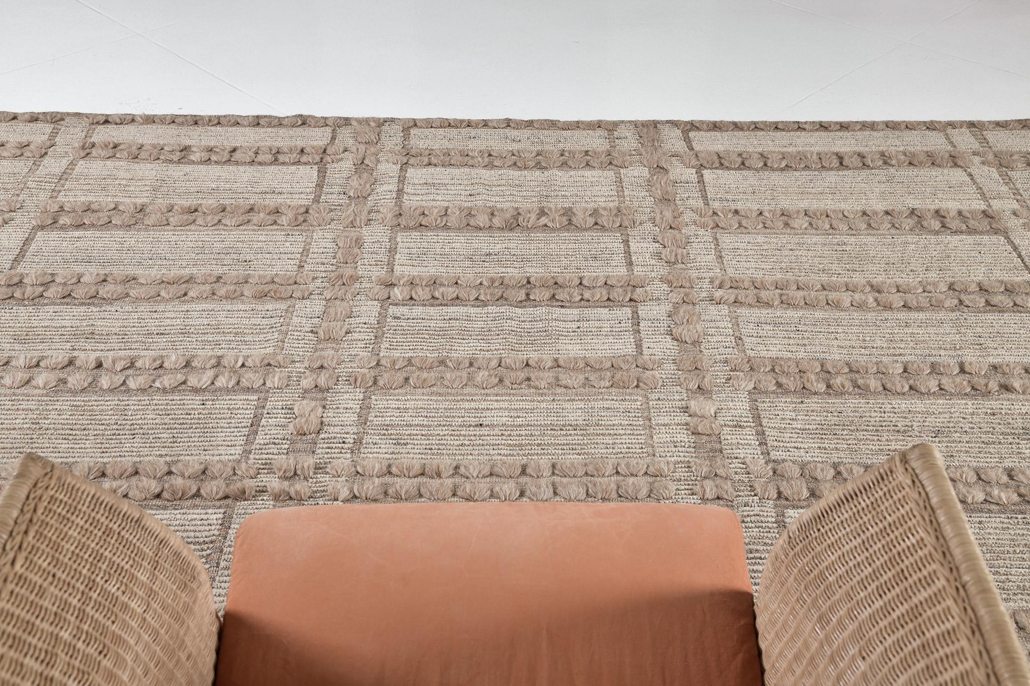 Colombard in Estancia collection features an all over rectangular pattern with dotted textured accents. Featuring the captivating shades of cedar and coffee, this rug is perfect to give character and style to your interiors. An alluring rug that