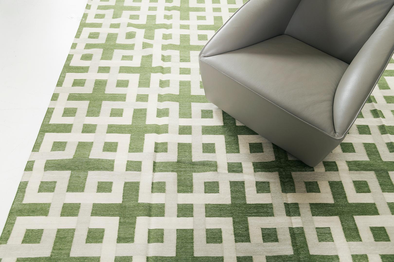 Estera’ features an all over series of several stacked boxes interconnected to each element to form a stunning pattern that leaves a cohesive illusion to this mesmerizing masterpiece. Elegant yet compelling, this rug is rendered in the stunning