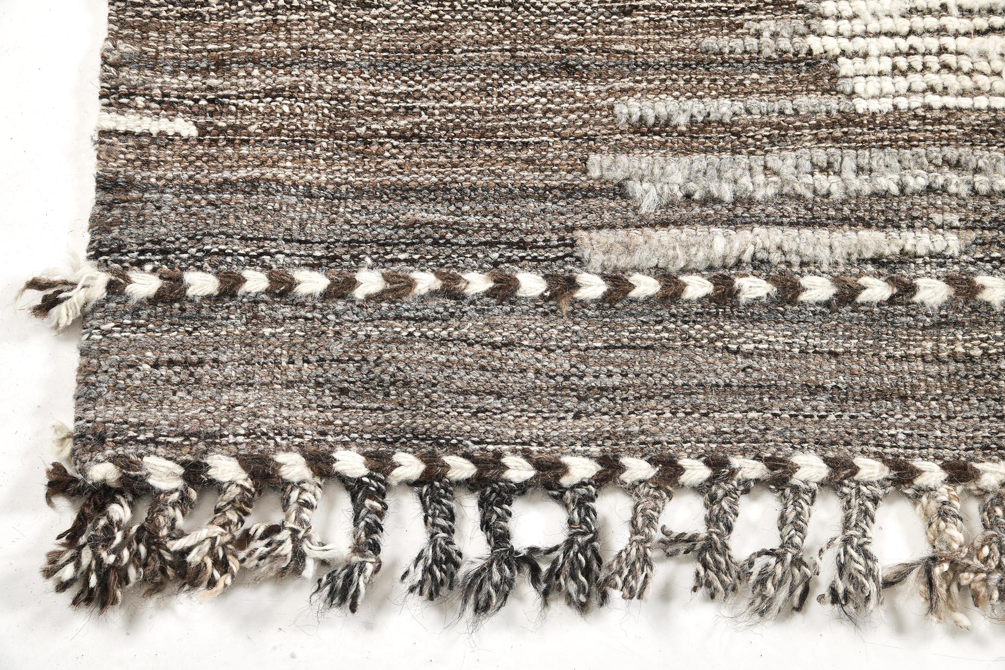 Dassin’ is an impressively detailed pile weave that fits seamlessly into modern and contemporary homes. The luxurious texture of the ecru and taupe design scheme gives a fascinating and relaxing ambiance. Mehraban's Atlas collection is noted for