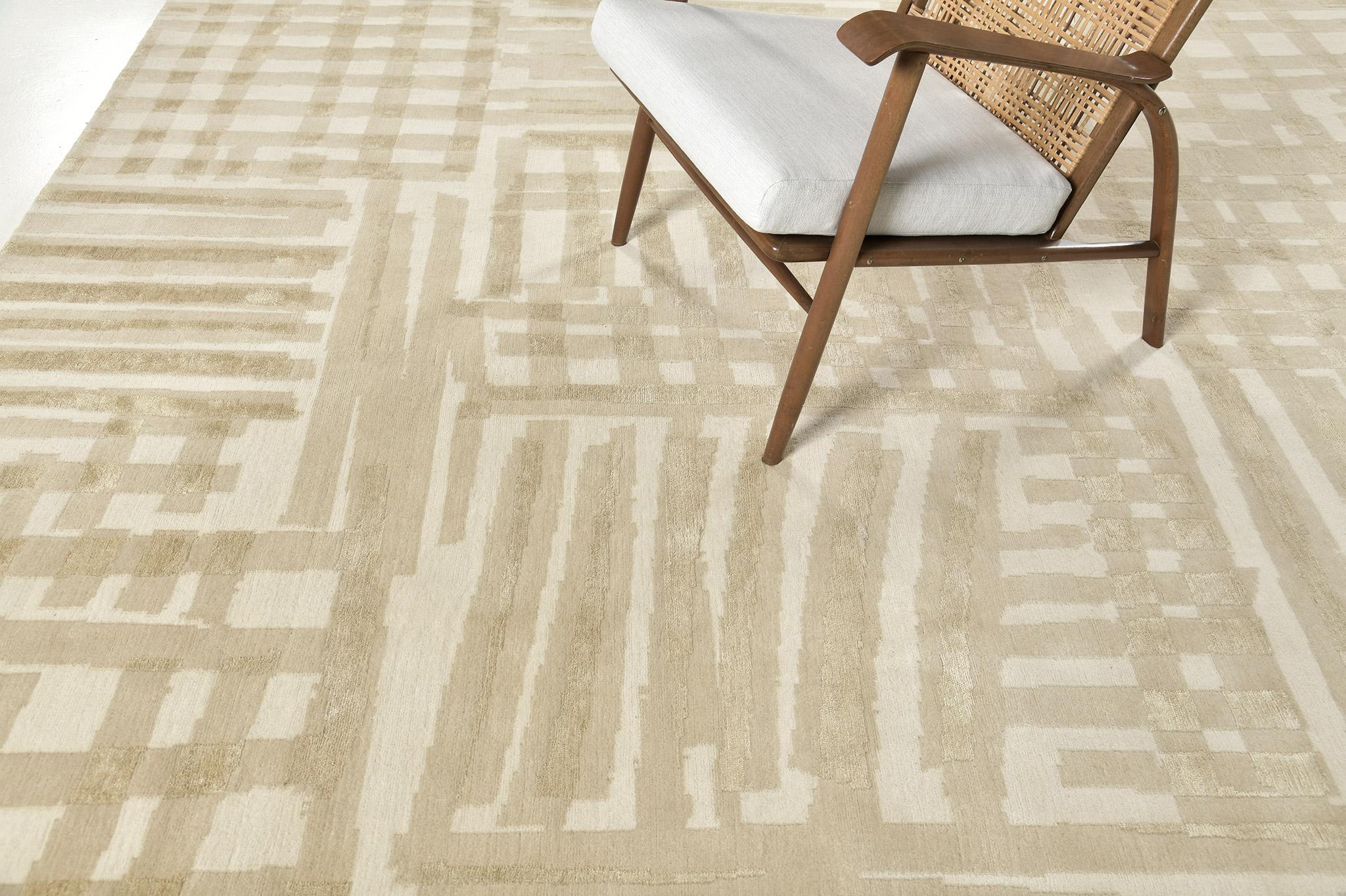 Due Volte is neutral-toned wool and silk that is inspired by various aspects of architecture. Featuring all the varying degrees of linear patterns,  this stunning rug features a classy and sophisticated kind of decor. A timeless design that is