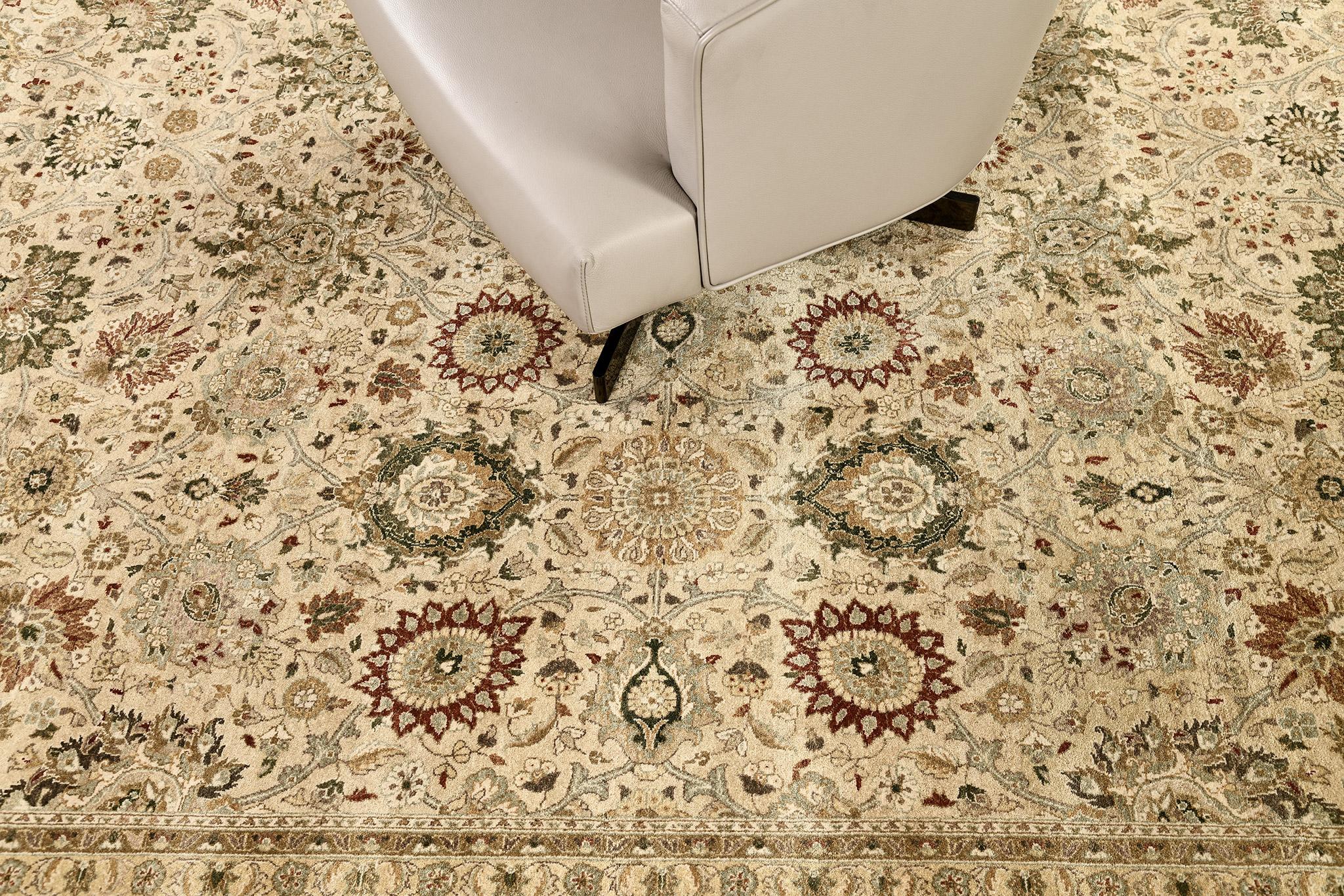This comprehensive hand-spun wool Tabriz rug revival features a neutral palette that makes this suitable for a whole host of applications. Series of embellishments in symmetric design that matches the pattern and makes it looks more elegant. Use it