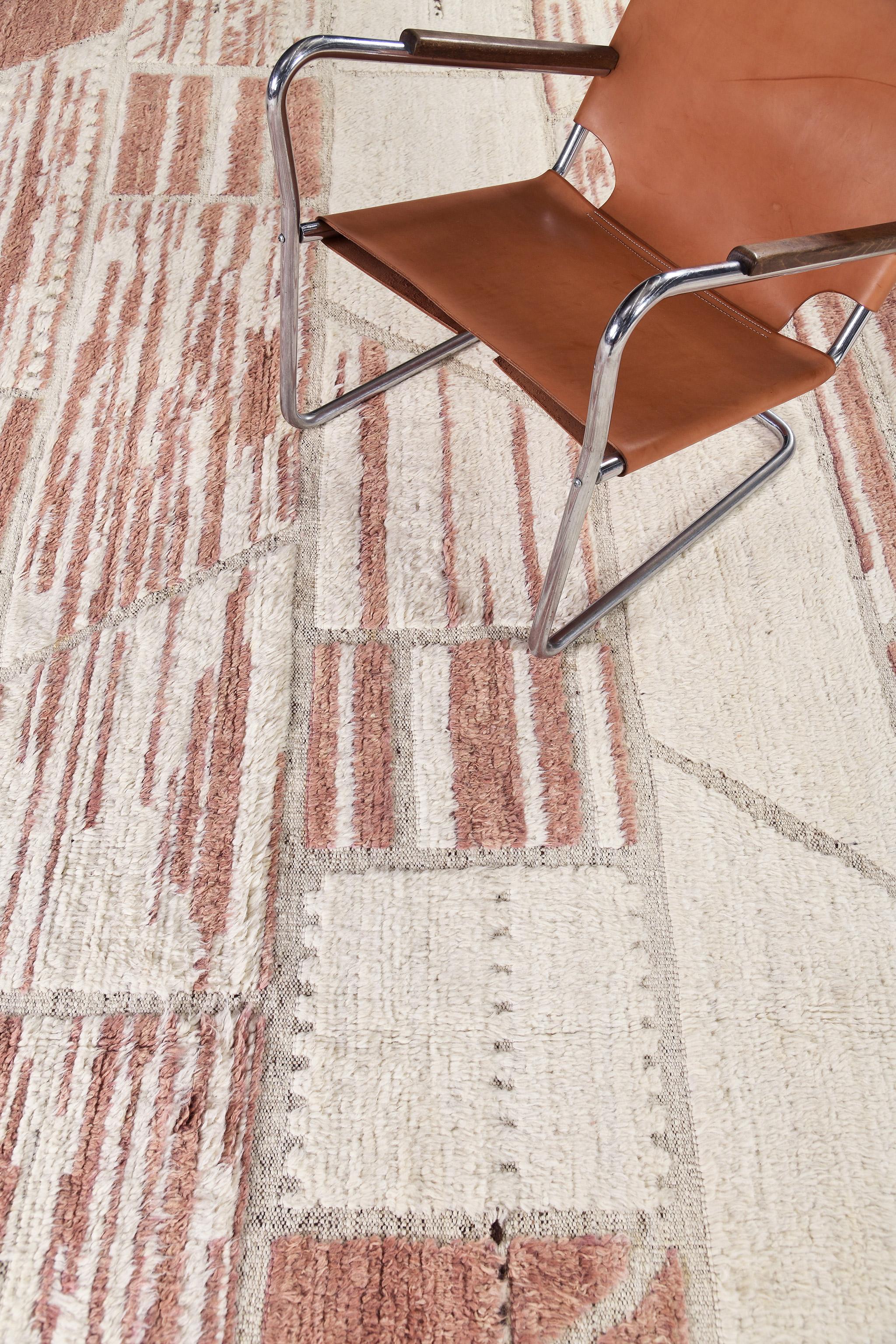Flogen features its embossed pile weave of earthy tones with pigments of muted coral and a remarkable layout. A contemporary and modern masterpiece that modifies your space into a sophisticated and chic home. Mehraban's Atlas collection is noted for