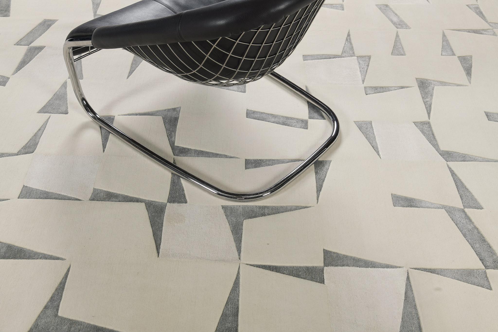 Fugue’ features a neutral optical illusion of stacked papers turning into one cohesive work of art . It is a part of the Design Rhymes Collection which pulls inspiration from different aspects of architecture. This rug is rendered in the most