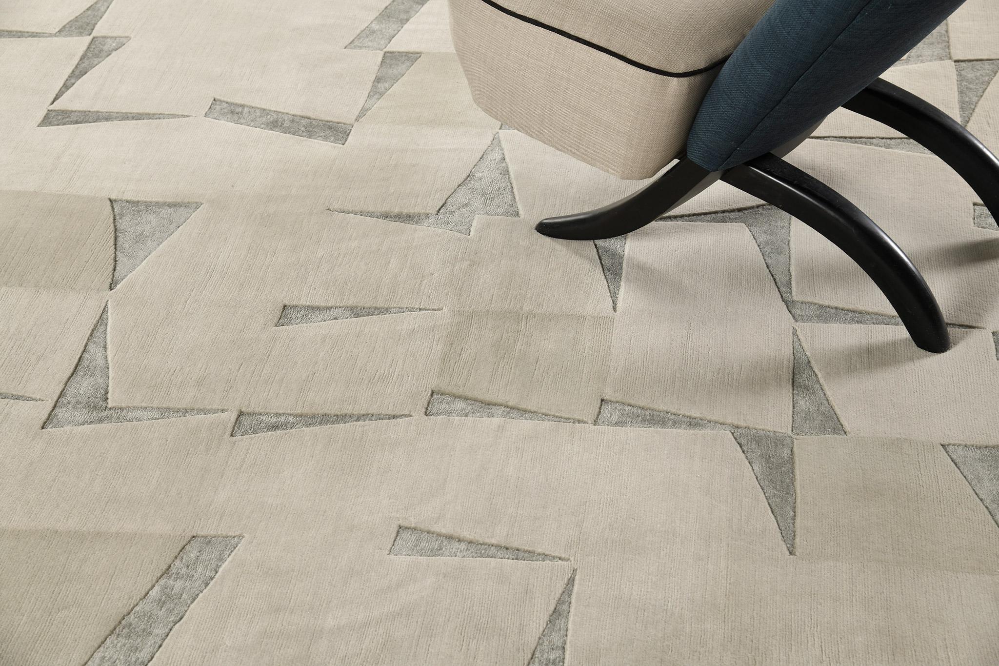 Fugue’ features a neutral optical illusion of stacked papers turning into one cohesive work of art . It is a part of the Design Rhymes Collection which pulls inspiration from different aspects of architecture. This rug is rendered in the most