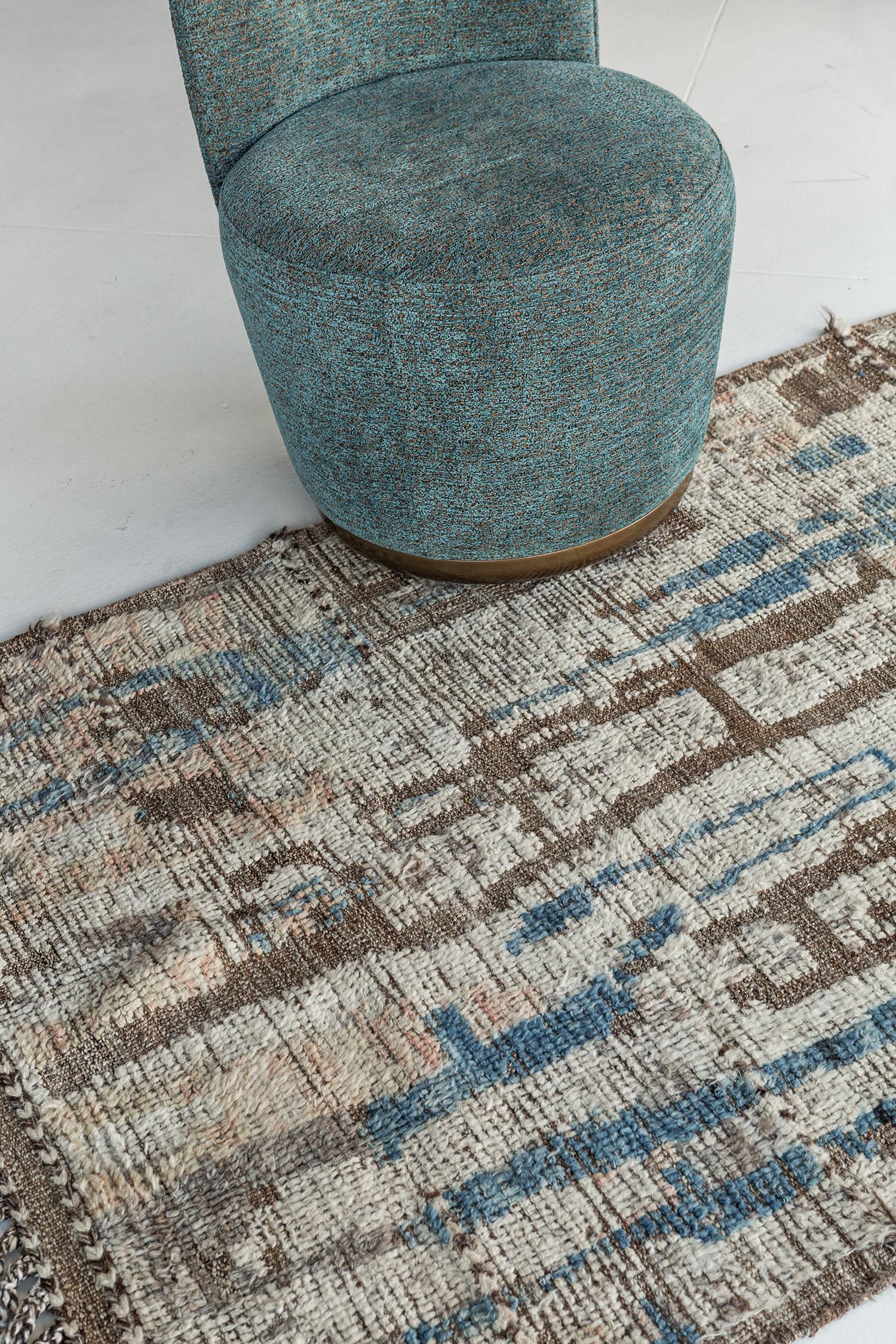 Halfah' is a natural earth toned pile weave and modern day interpretation of the Moroccan world. The rugs irregular shapes and strokes resemble the fibers of nature and their ability to be used for crafts such as cords and basketry. Designed in Los