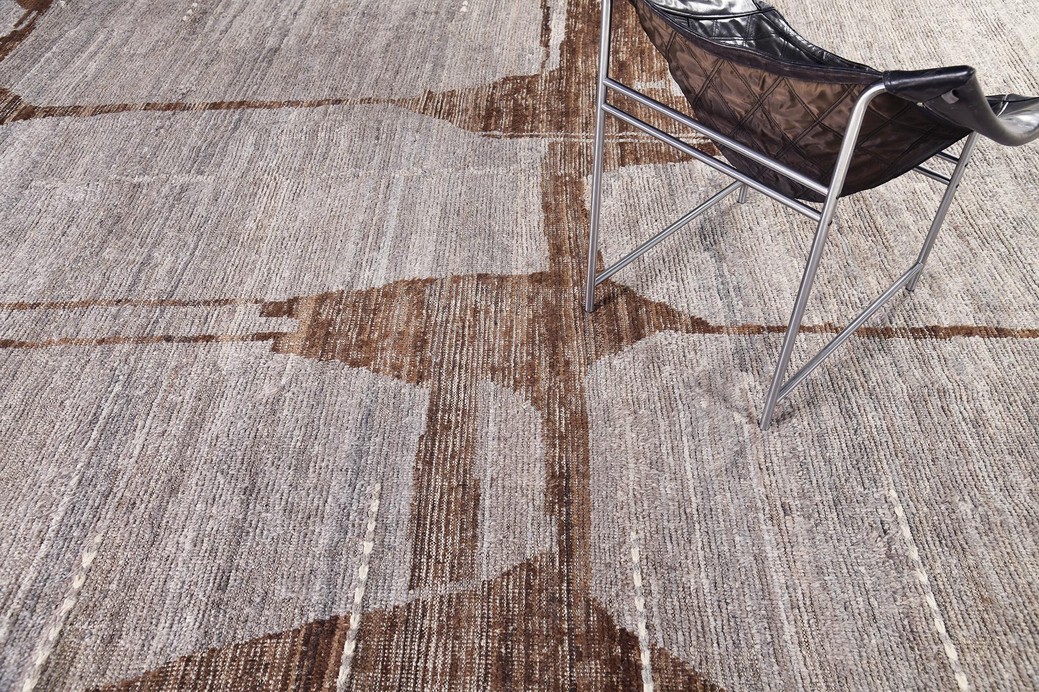 Jawahir est un tapis aux tons neutres et une interprétation moderne du monde marocain. Les taches irrégulières de taupe et de charbon de bois de ces tapis rappellent les fibres de la nature et leur capacité à être utilisées pour l'artisanat, comme