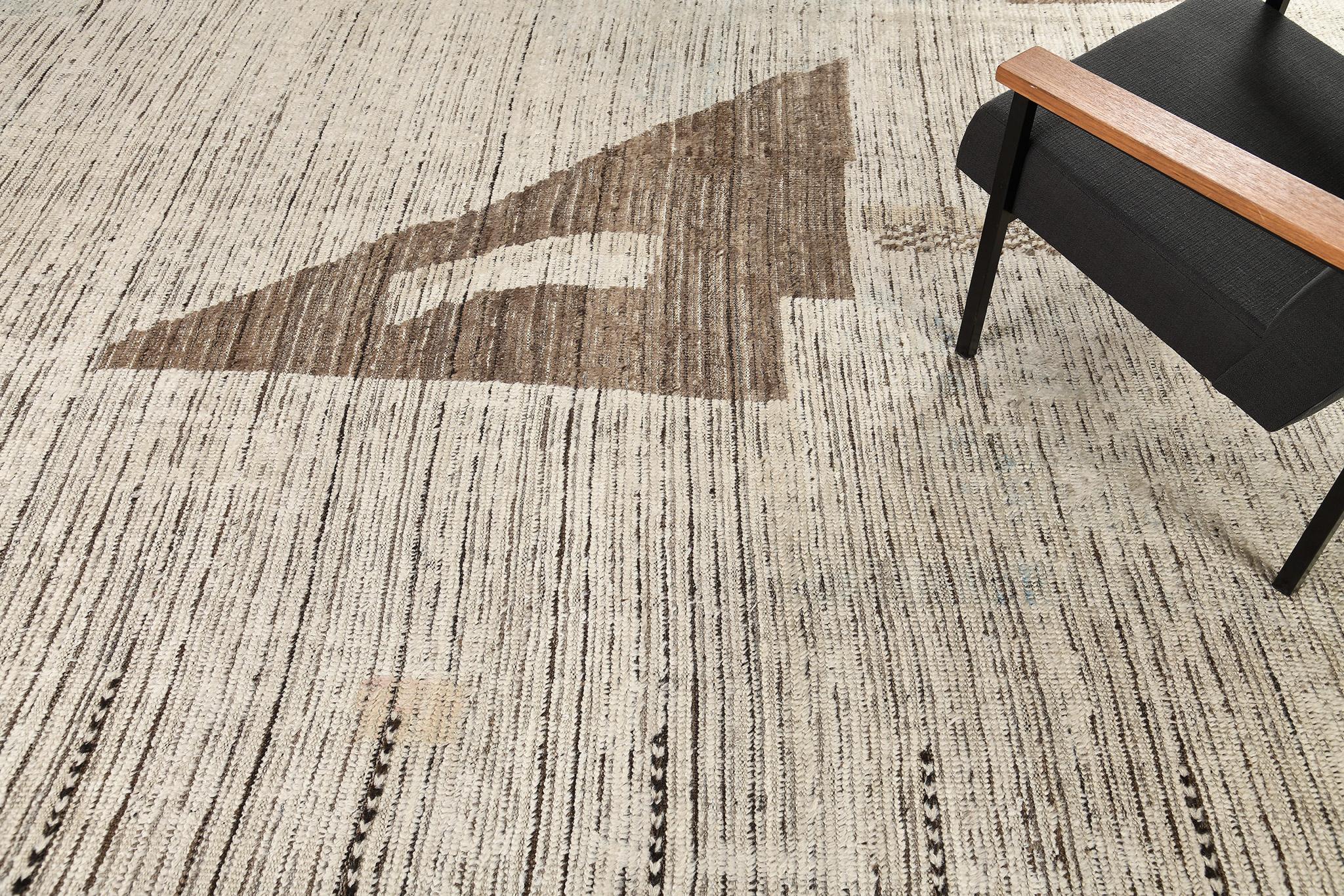 Kaouki' is made of luxurious wool and is made of timeless design elements. Its weaving of natural earth tones with unique design patterns and shapes is what makes the Atlas Collection so unique and sought after. Mehraban's Atlas collection is noted