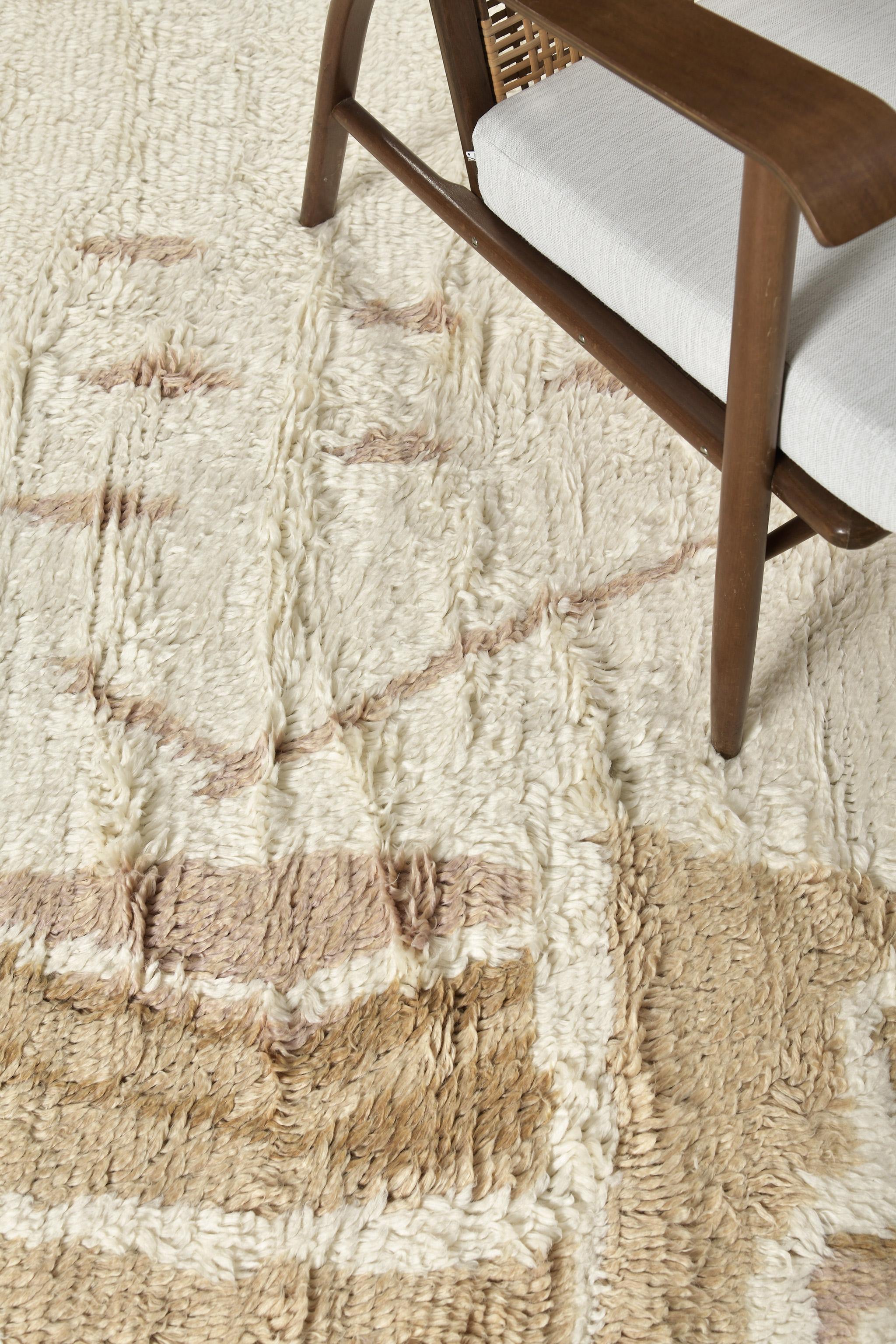 Kareen is an embossed neutral-toned pile weave that illustrates a story that is open to interpretation. Modern contemporary interiors are an excellent choice to be paired with this masterpiece. Mehraban's Atlas Collection is known for its intuitive