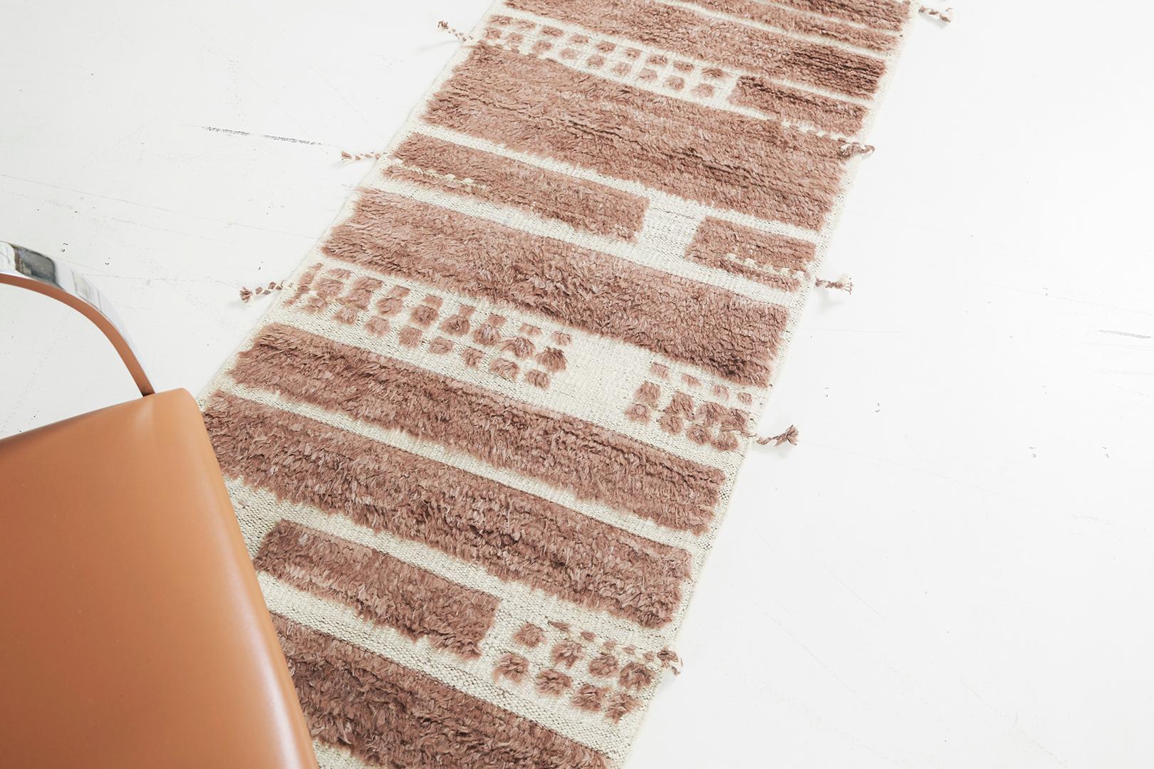 Displaying a vibrant feel of sophistication, this Katabatic’ rug from Haute Bohemian is in the stunning shade of rust. It’s embossed pile weave and aesthetic design brings out the comfort that everyone will surely love. The Haute Bohemian collection