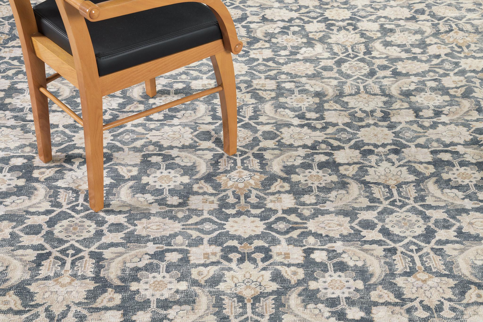 Khosh Hall is an overall designed distressed rug in our Domicile Collections. An oversized rug that can fit in your wide room spaces. A Series of symbolic motifs and elements are accentuated and flaunted in this rug. Get captivated by our collection