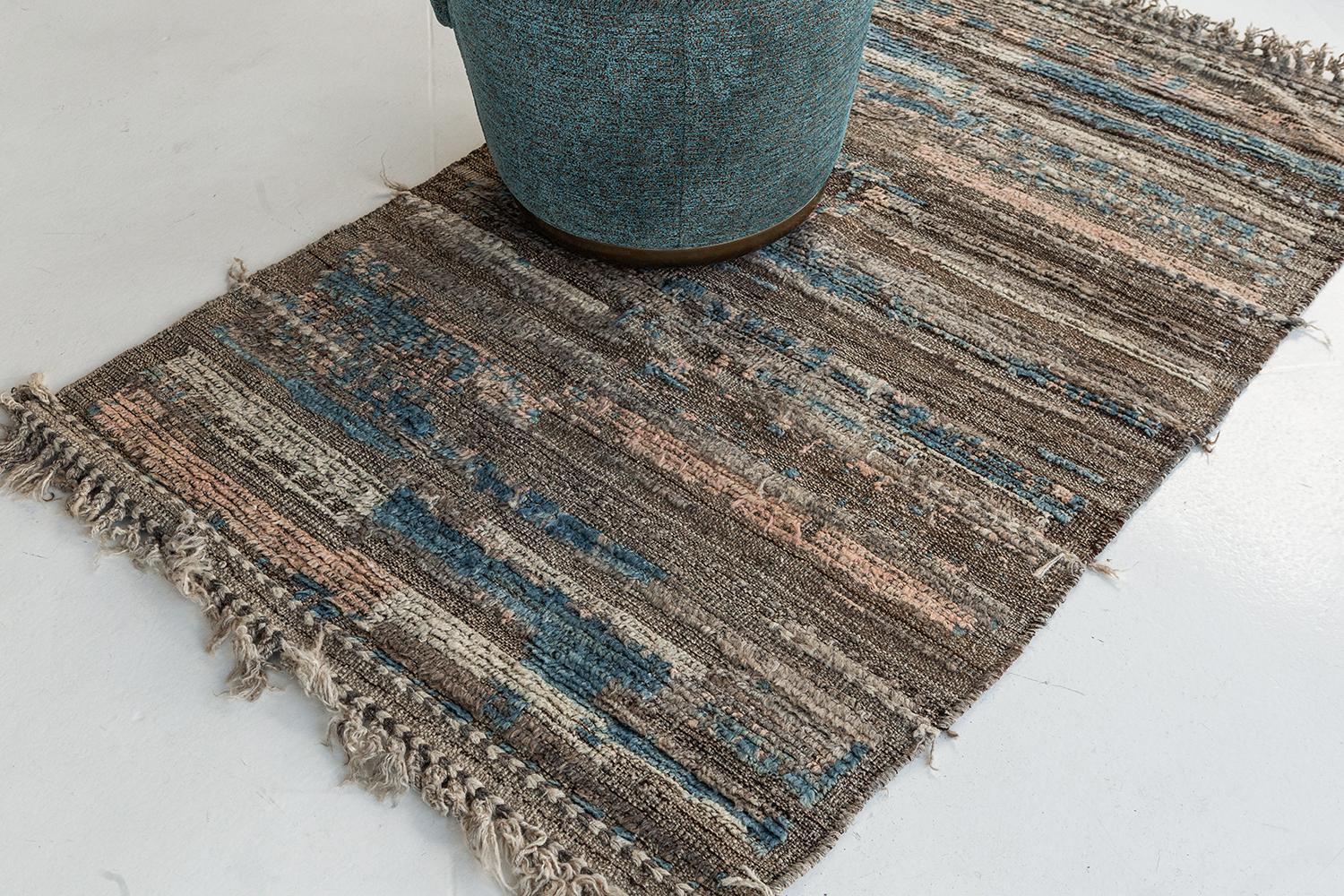 Malaren' is a luxurious wool rug with timeless embossed detailing. In addition to its perfect natural flat weave, Malaren has earthy tone shags that bring a lustrous texture and contemporary feel to one's space. With its plush pile, functional