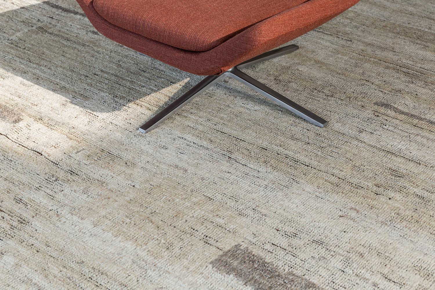 Malaren' is a luxurious wool rug with timeless embossed detailing. In addition to its perfect natural flat weave, Malaren has neutral tone shags that brings a lustrous texture and contemporary feel to one's space. With its plush pile, functional
