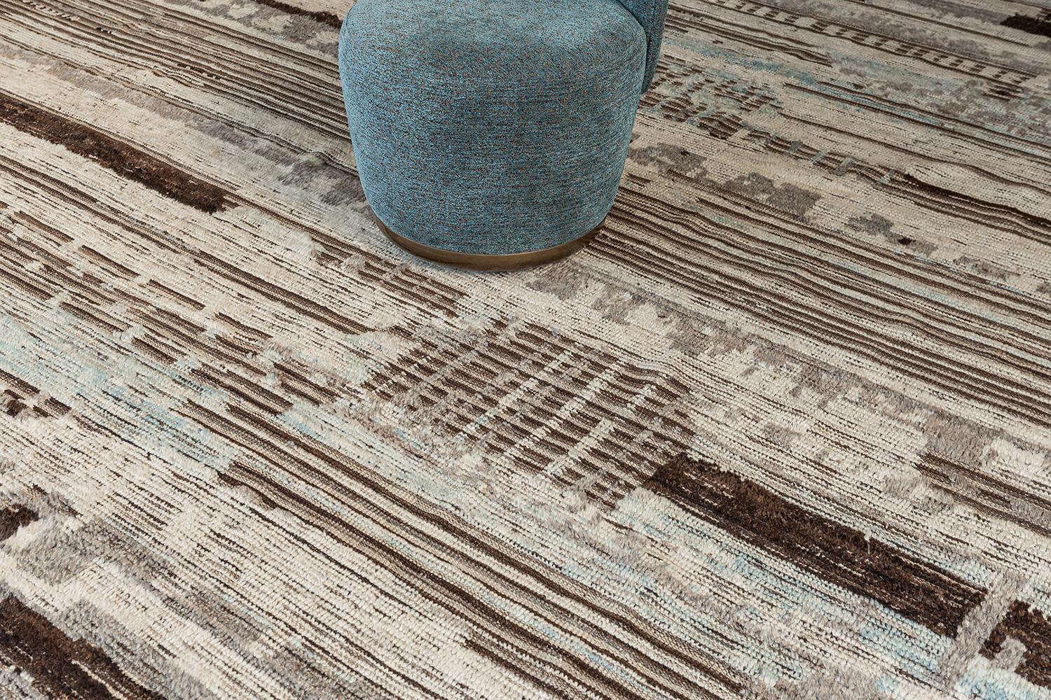 Malaren is a luxurious wool rug with timeless embossed detailing. In addition to its perfect natural flat weave, Malaren has earthy tone shags that brings a lustrous texture and contemporary feel to one's space. With its plush pile, functional