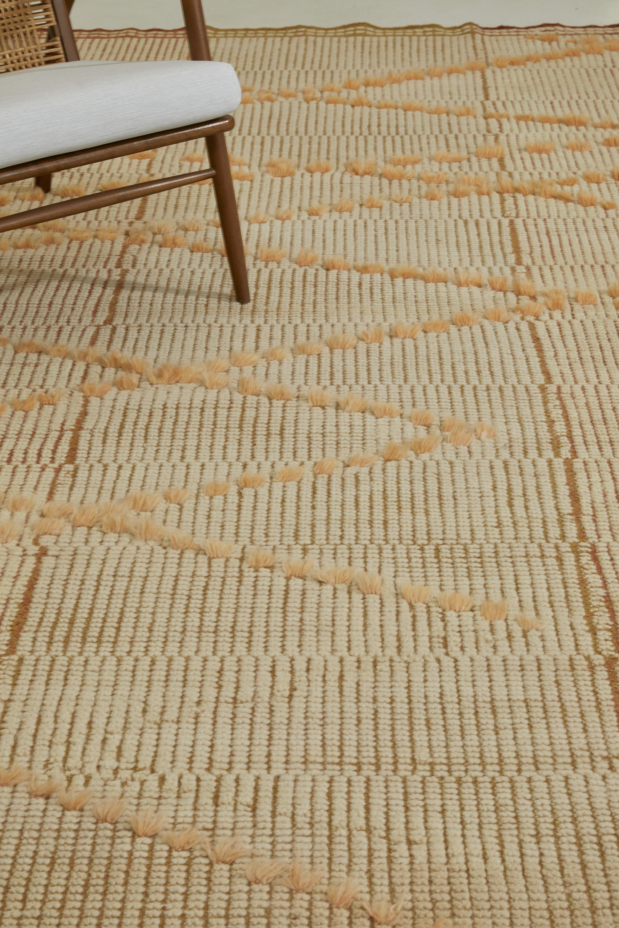 La Malvasia è composta da un motivo a traliccio con nodi lunghi su un campo di velluto annodato a fasce variabili. I riflessi della trama piatta sono visibili ad angoli obliqui.

Qui realizzato con zafferano e mandarino a trama piatta con pile di