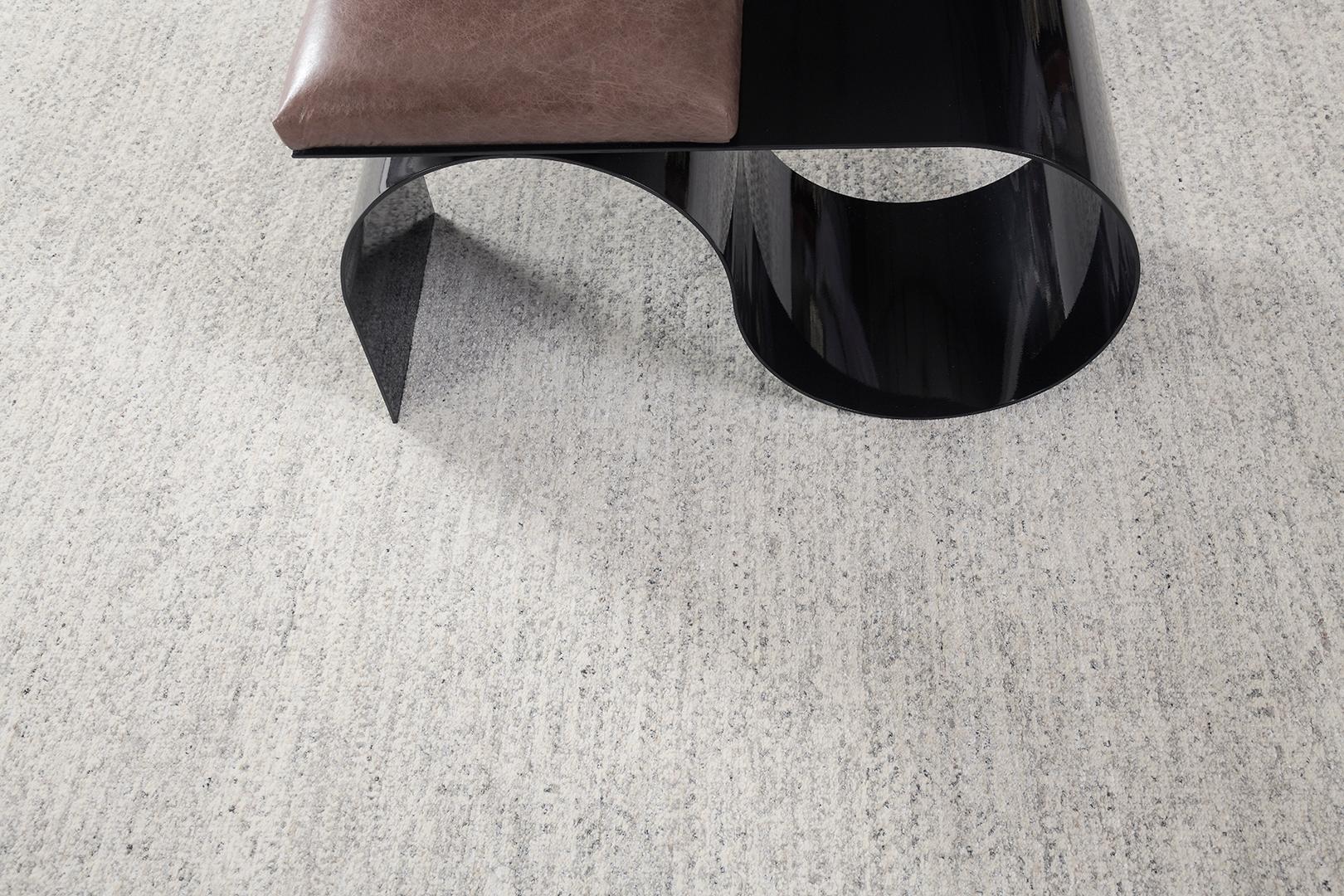 Michelle is luxurious wool from our Naturale collection that plays up a simple yet stylish minimalist design. A stunning sluggish pattern of smoke is perfect for a neutral-toned wall and shades that can make the centerpiece a hit to the eyes of your