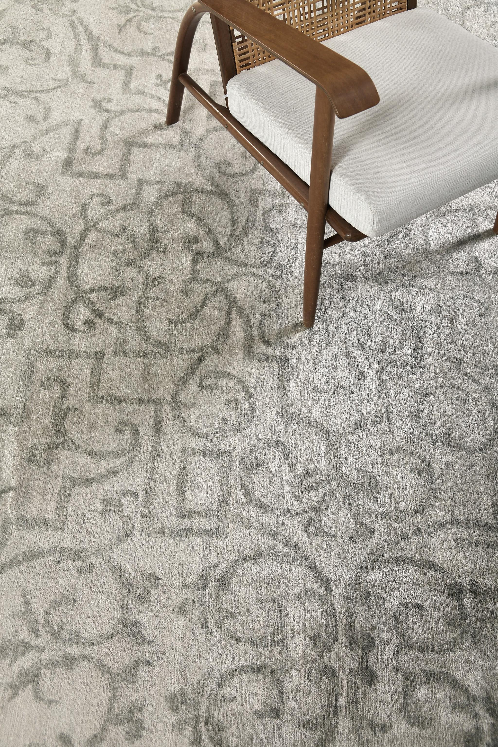 Alum is bamboo silk that features embossed curling motifs over a stunning combination of neutral tones. Rich in styles and strokes that make your guests engaging and admiring. A decor that will add harmony to your modern interior.

Rug