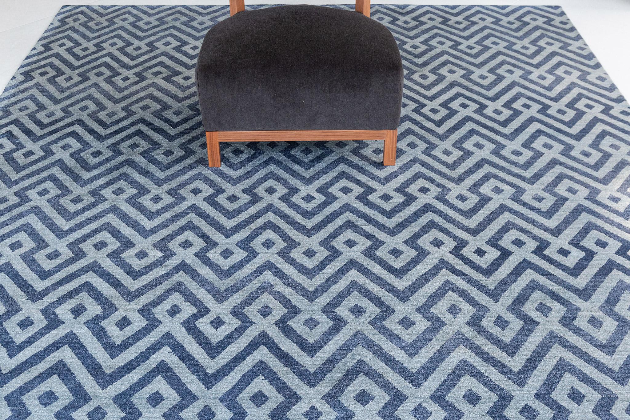 Devi is a bamboo silk rug in an all-over chevron-like with geometric diamond pattern outlined in pale and opaque blue. This masterpiece complements a contemporary and minimalist interior that everybody would adore.

Rug Number
25829
Size
8' 0