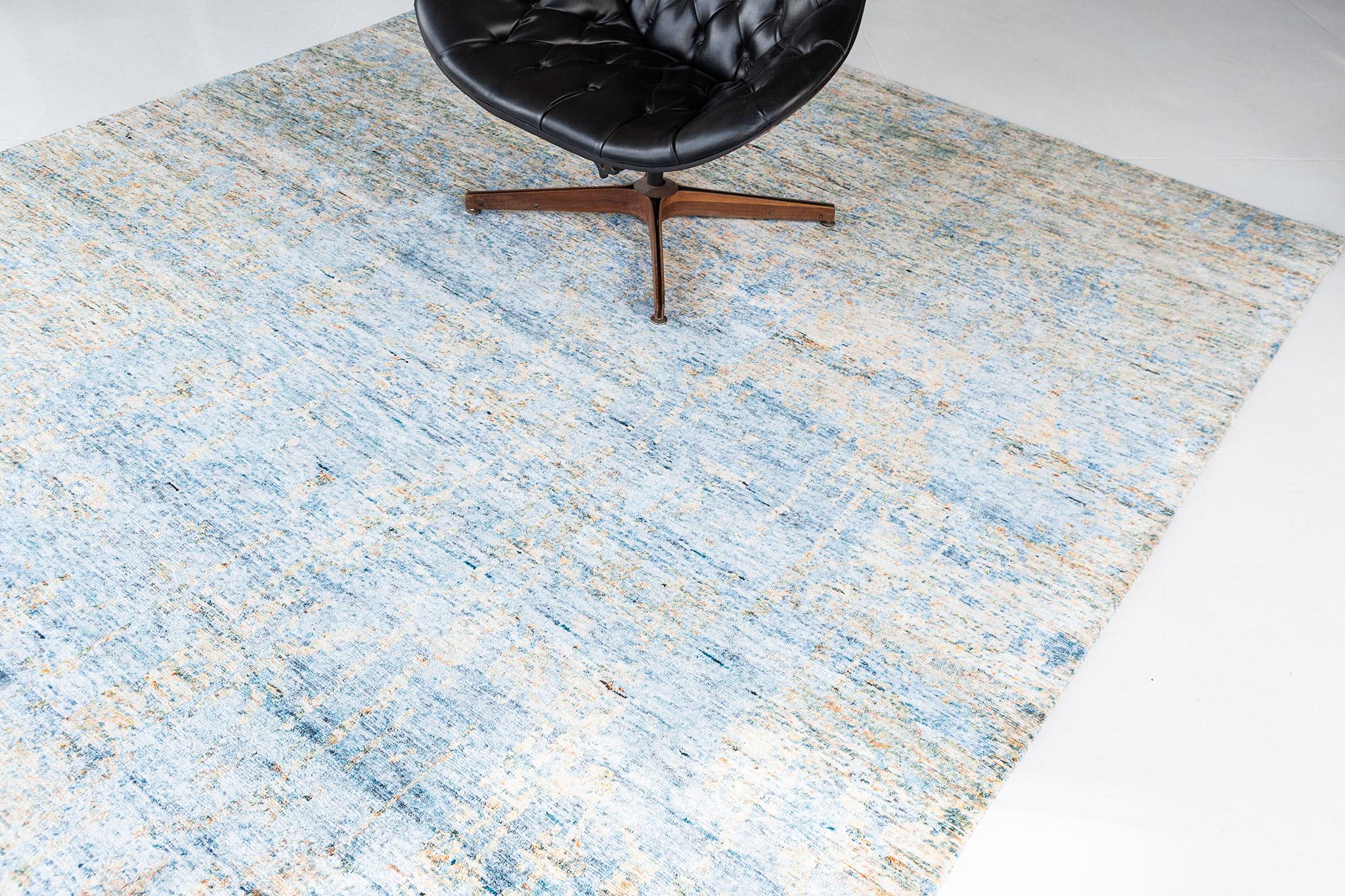 Maruti is bamboo silk in a stunning earthy tone with a beautiful vague representation. A masterpiece that feels like spring because of its warm ambiance. The soft detailed yet elegant interior further brings out the artistry of this rug.

Rug