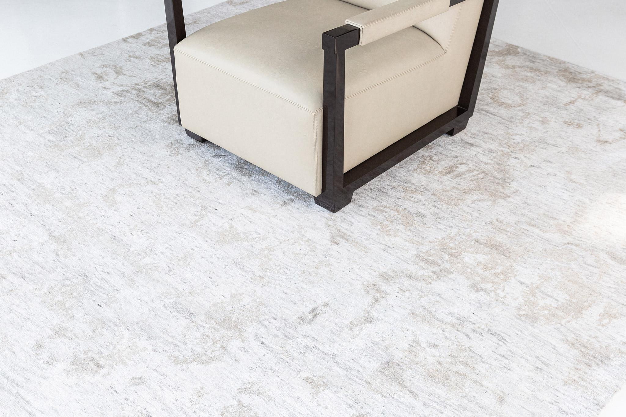 Vortice is a bamboo silk rug in smokey abstract over stunning tones of bluish-white and soft dusty sage. A masterpiece that balances the luxurious quality with contemporary and modern spaces. An eye-catcher that would be loved by your guests.

Rug