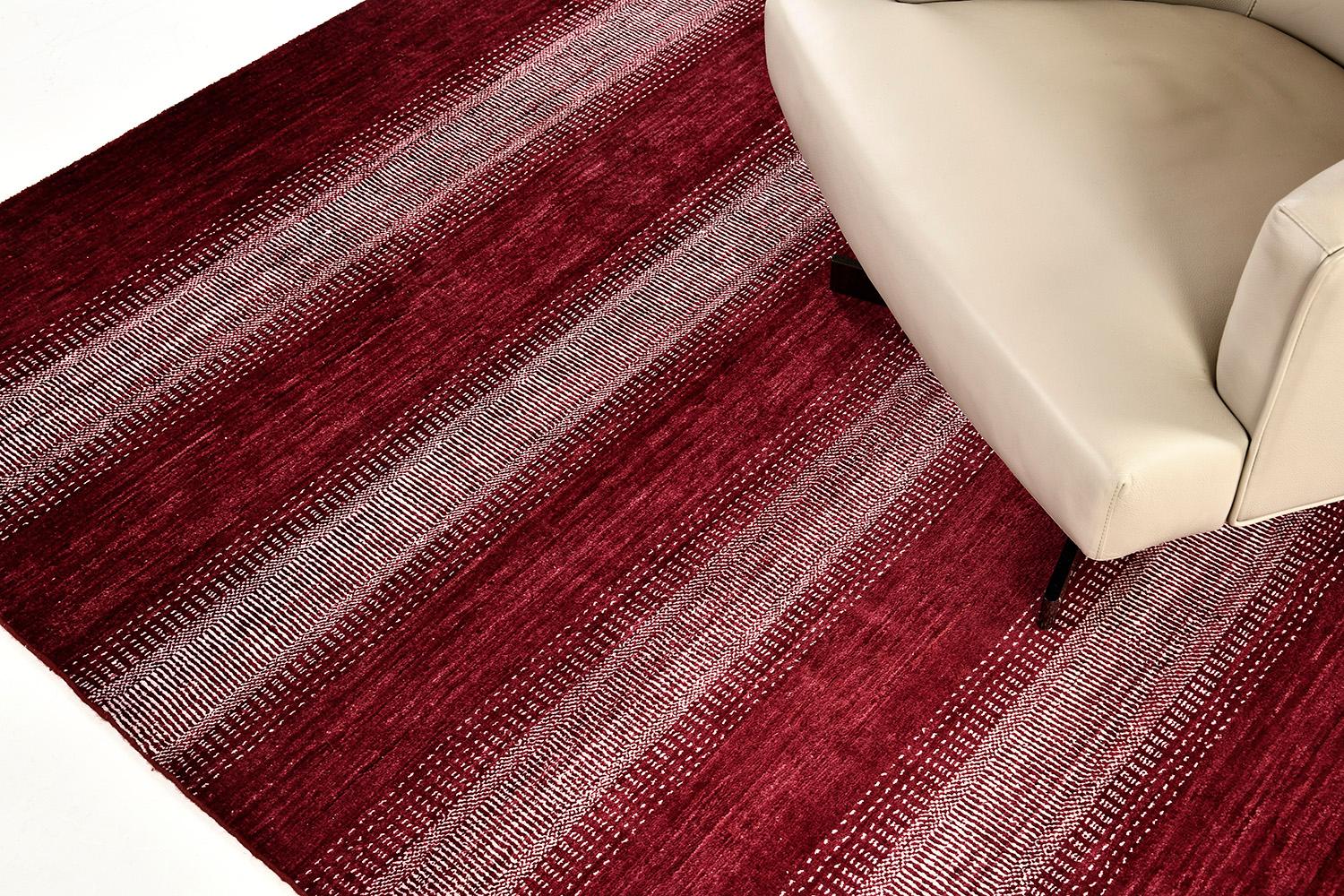 From our Naturale Varieties, this Essato Design features the vertical bands of blushing red and saturated black. Essato is known for its playful colors that your home furnishings and decors are perfect for the contemporary interiors.

Rug Number