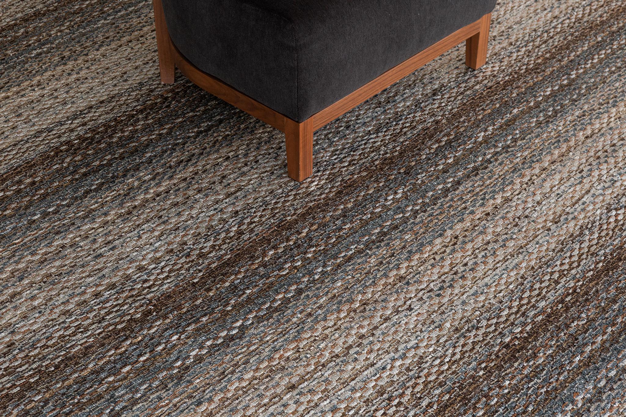 A fascinating modern hand loom rug in our Luca Collection. The delicate ribbed style rug in neutral brown tones give it a sophisticated and beguiling feel. Repeating pile detailing also brings a tranquil and noteworthy uniqueness to this piece. This