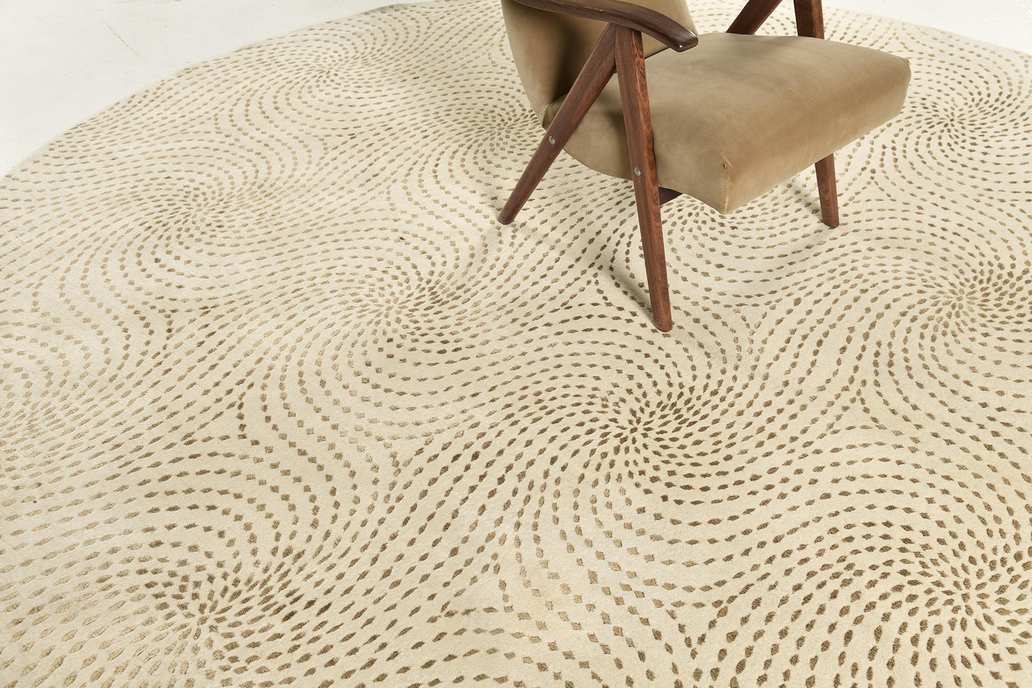 Dieser atemberaubende nepalesische Teppich ist eher für ein zeitgenössisches Thema geeignet und zeichnet sich durch ein elegantes Muster aus gepunkteten Wirbeln aus, die den runden Teppich bilden. Ein Wohndekor, das Ihrem Raum ein bekanntes Ambiente