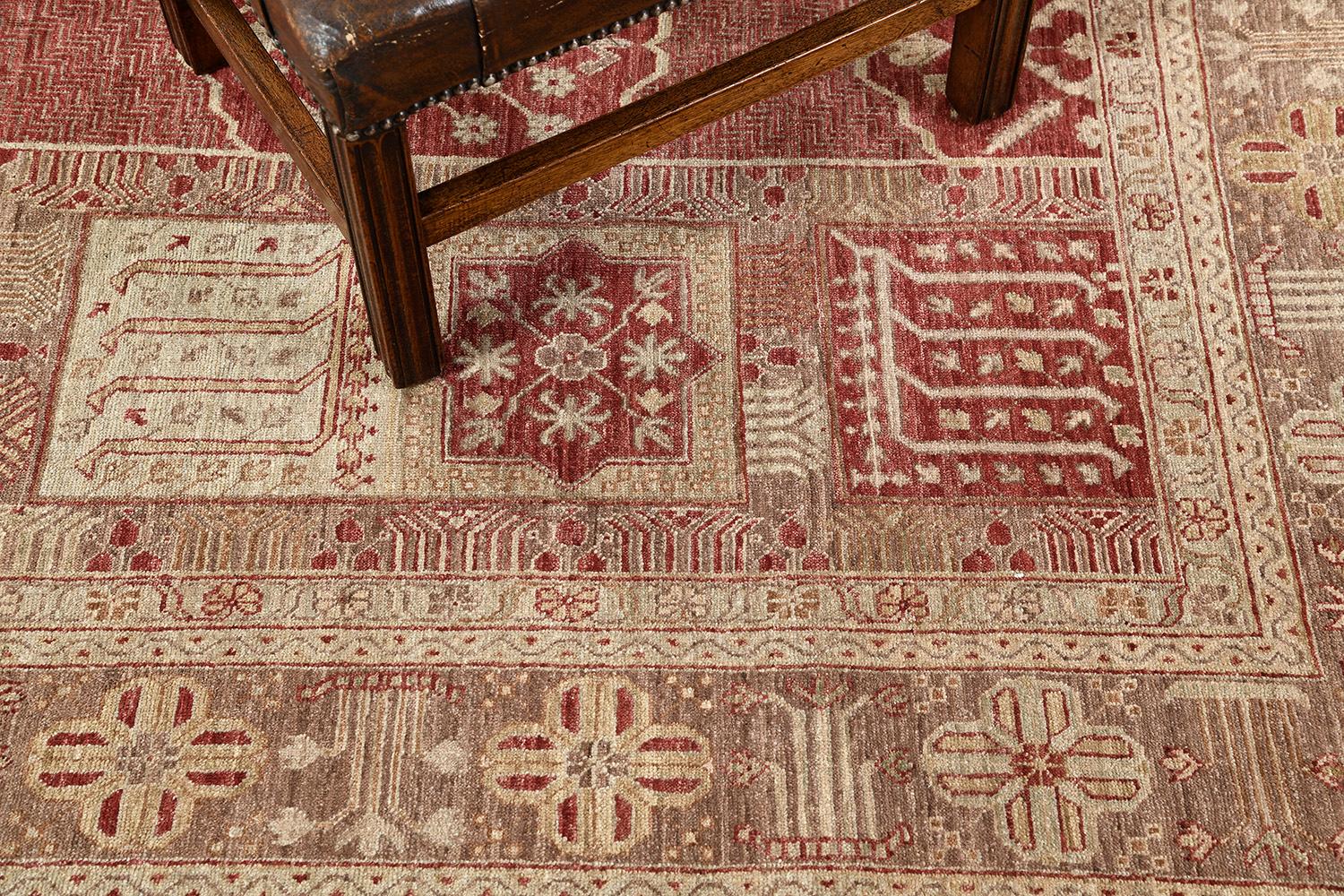 This impressive rug revival features floral vines and symbolic motifs over beautiful wool in gold and red theme. A beautiful border with a natural scheme shows floral motifs that give this rug a sophisticated aesthetic. Best suits to your
