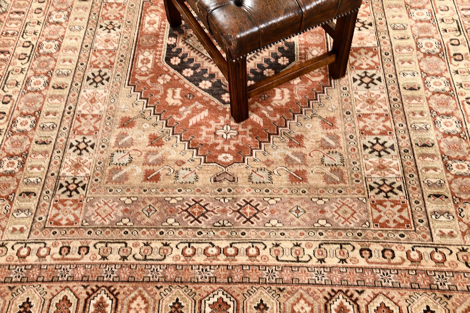 Who wouldn't fall in love with this Gashgai Style Rug revival? A series of bands run along the perimeter of the center medallion. Repeated motifs and geometric motifs are indicated and well-coordinated with warmtones. This one is right for your