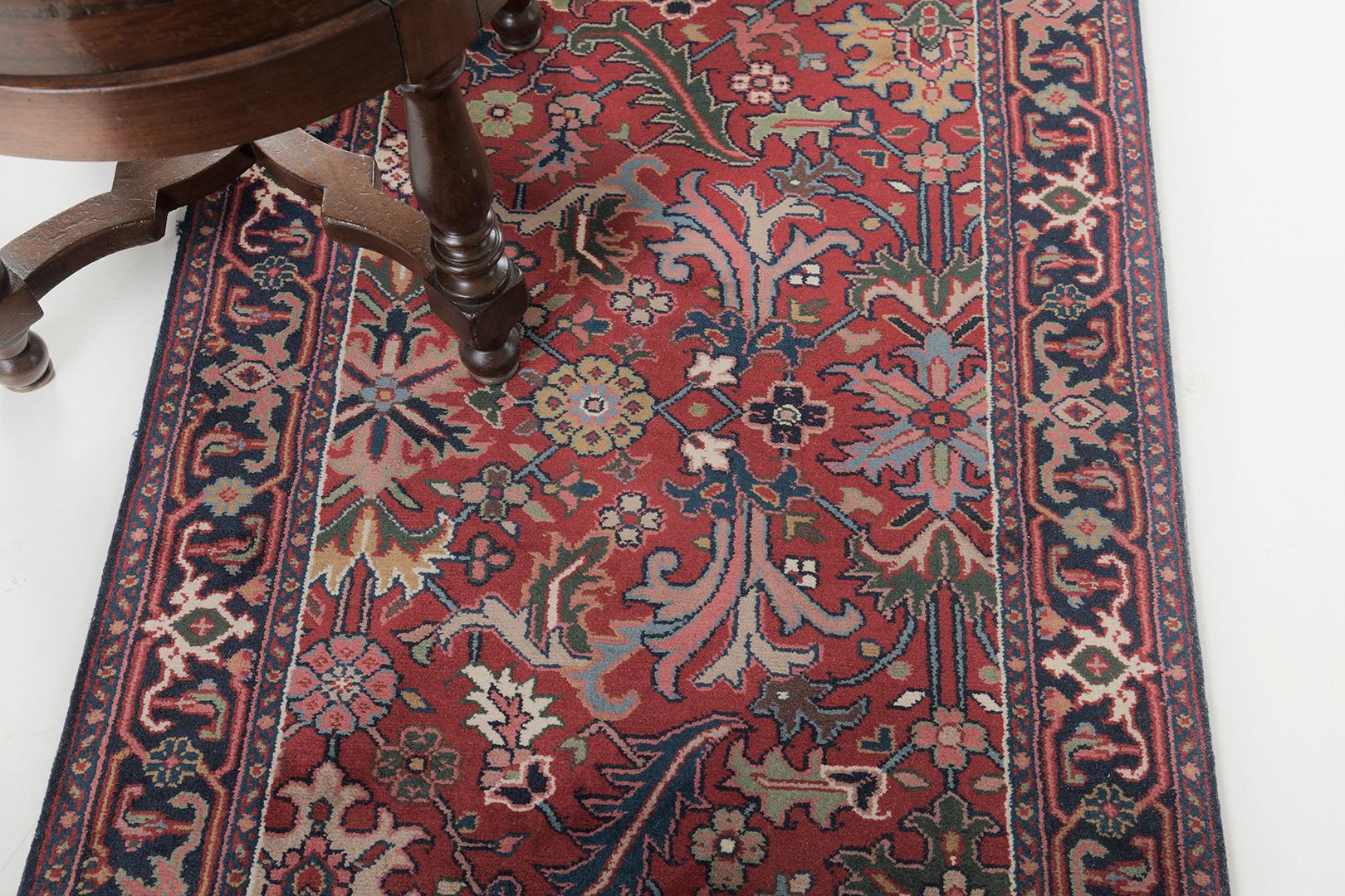 A stunning revival of Indo Kashan runner that features a penny-worth impact from its every design. At its core, majestically presents a detailed floral theme and foliage. An effortless combination of various symmetrical symbolic motifs is in the red