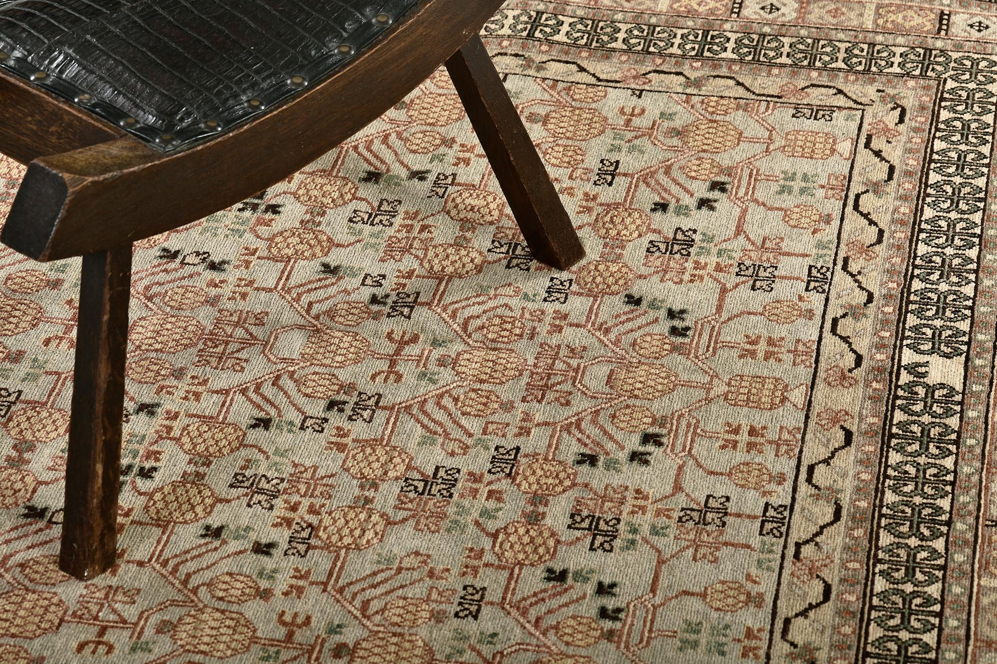 A meticulously hand spun wool Khotan design revival from our Bliss Collection has come and flex its versatility. Stylized motif and assymetric geometrical designs in a chocolate field manifest the entire pattern of the rug. This rug is flexible for