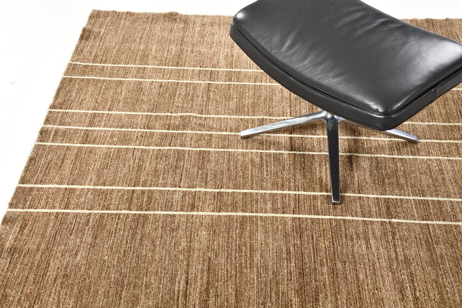 An outstanding creation of Modern Mondrian rug that elegantly establishes the exceptional intricacy through a design of light outlines to a horizontal stroke of umber brown. With its versatility, this masterful piece made from hand-spun wool would