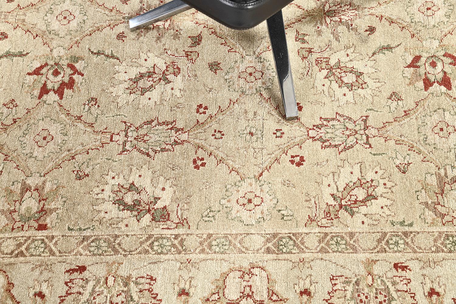 This elegant Turkish Sultanabad revival rug features the majestic motifs and symbols of the symmetric design masterpiece. The borders are beautifully designed pile-woven from wool to form a stunning Sultanabad Design. A truly wonderful creation that