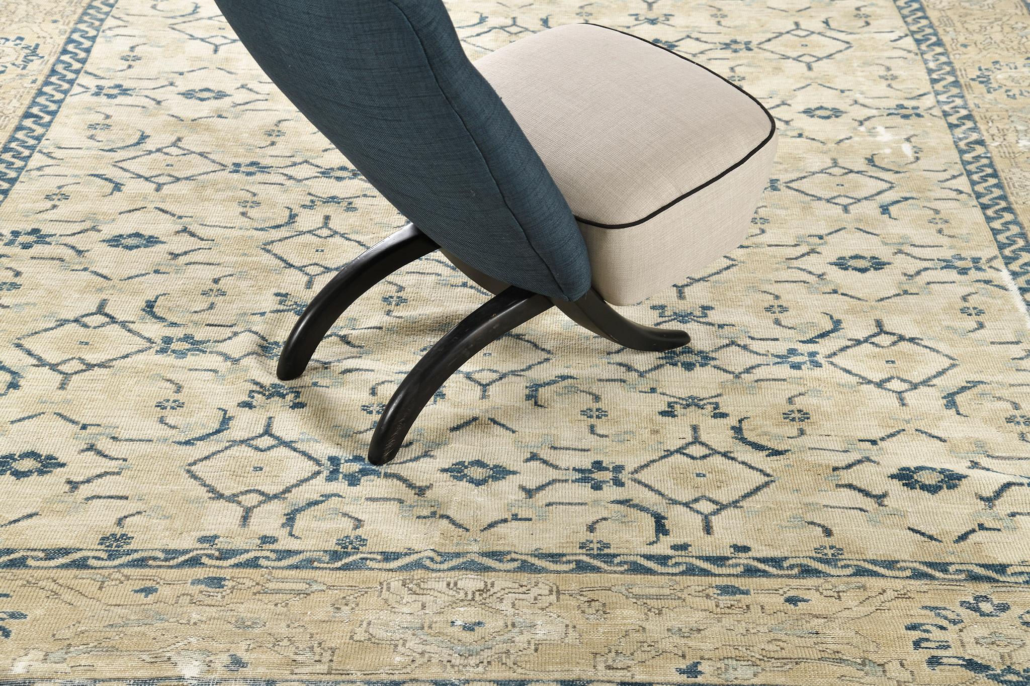 Othon’ in Domicile Collection features dainty botanical motifs running along gracefully in the khaki field. Highlighted with aegean blue accents, this rug is enclosed with a series of blooming palmettes and S motifs. A magnificent rug that would be