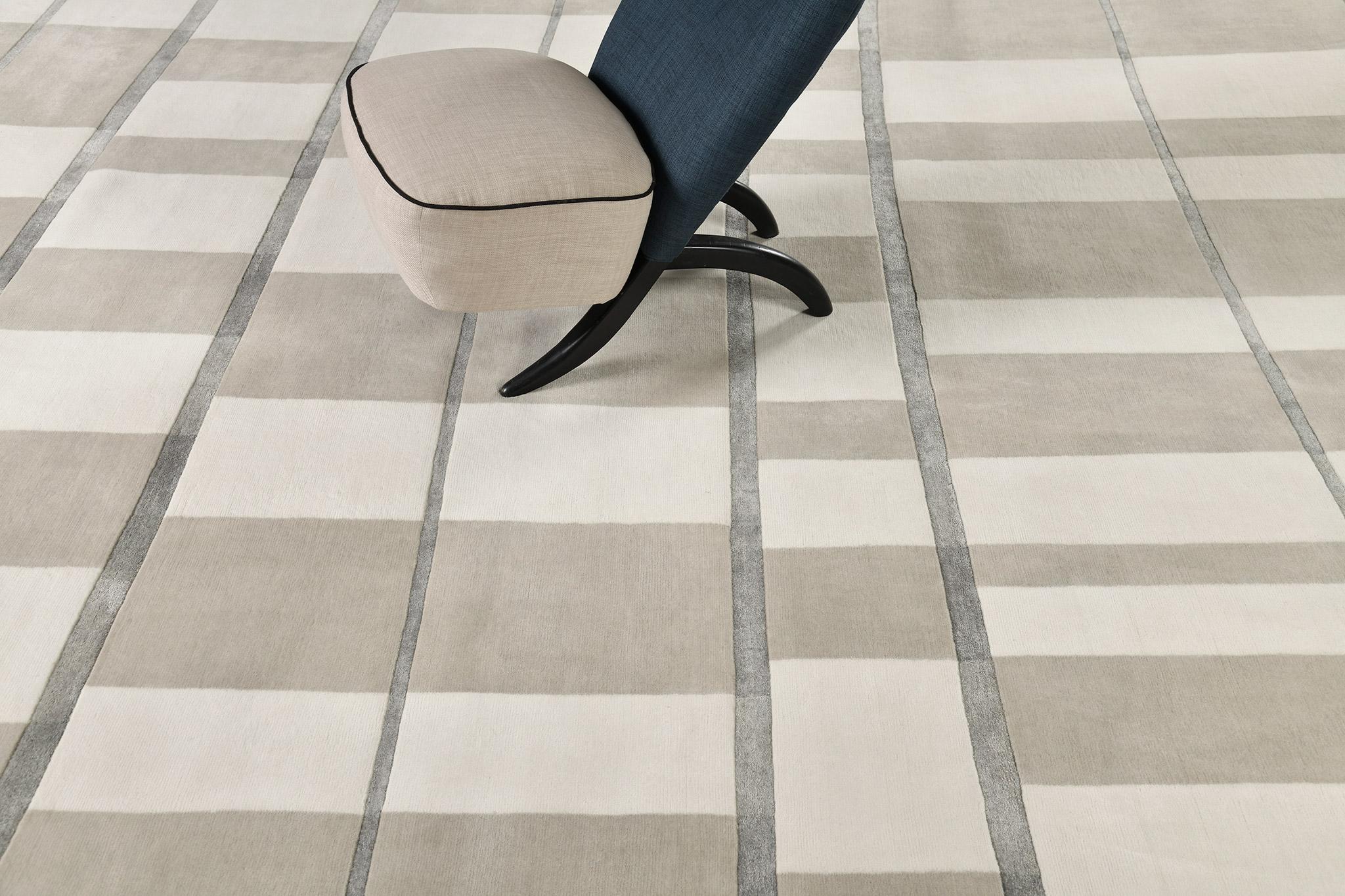 Pazienza expresses its simplicity and charm that adds exquisite beauty to your interior. Alternates of taupe and ivory with some deep taupe lines show how stunning and remarkable this rug is. A rug that complements every interior and is much