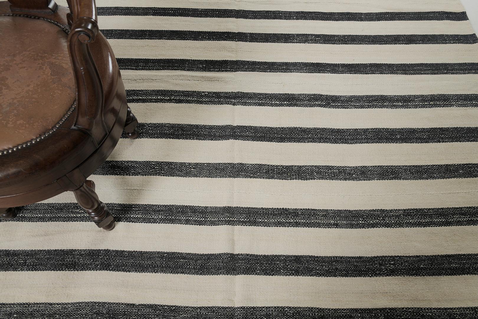 Persian Jejim Kilim is flat weave wool that has dark and light horizontal stripes. With its simplicity and grace, it is flexible in every interior you want to arrange with. 

Rug Number 26760
Size 11' 1