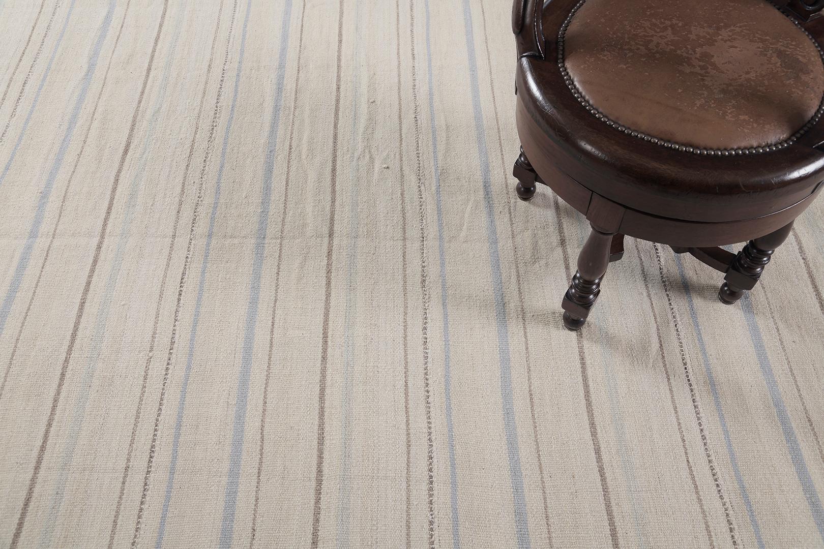 An excellent neutral shade of flat weave wool creates a fresh and new impression in the modern world. These multi-width stripes look adorable and ideal for every modern and contemporary interior. Persian rugs are one of our most sought-after rugs