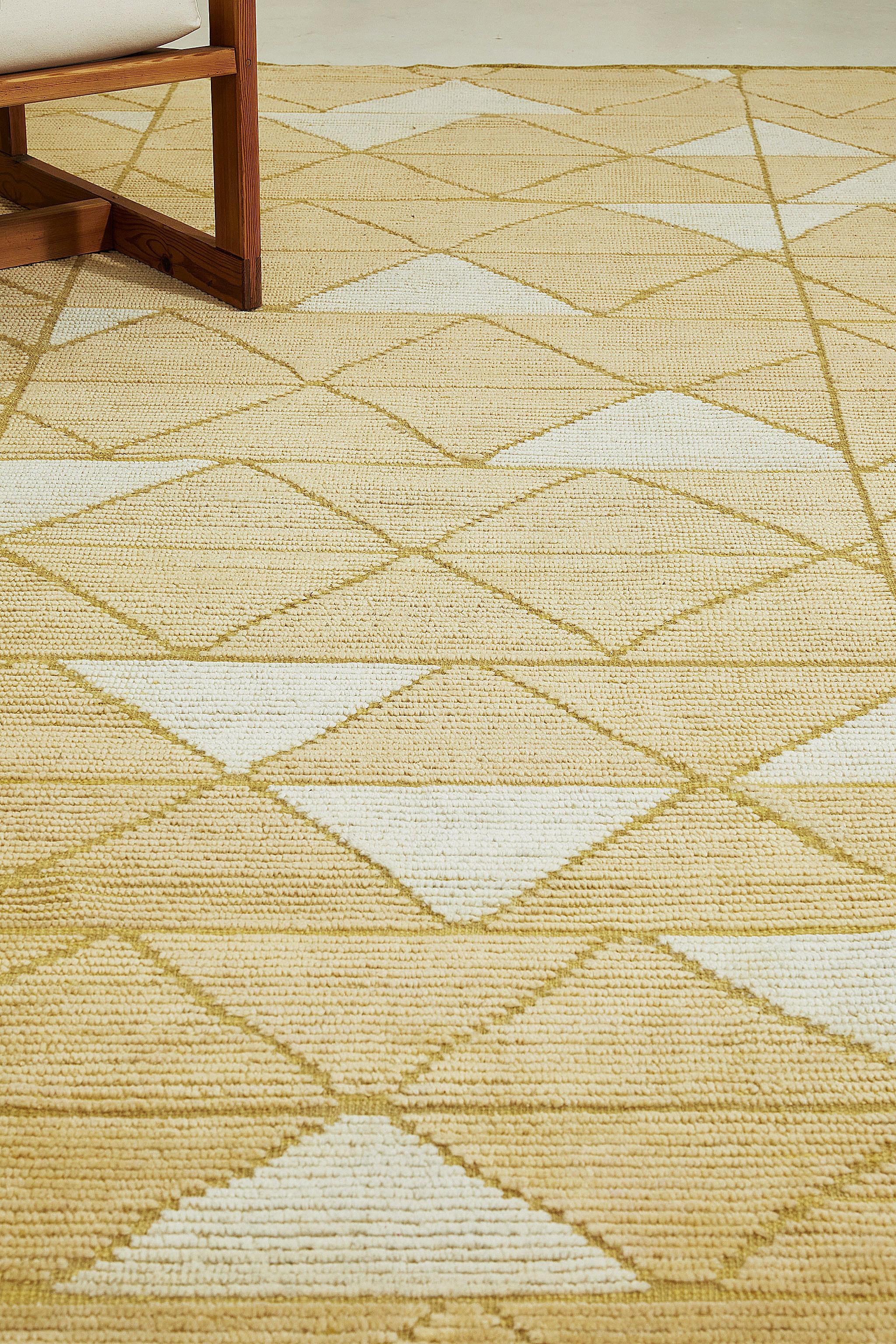 Pinotage’s triangle riff plays out in trim pile with contrasting flatweave lines.

Here in gold with ivory accents.

The Estancia Collection by Mehraban is a group of casually sophisticated rugs in a versatile array of upbeat colorways and design