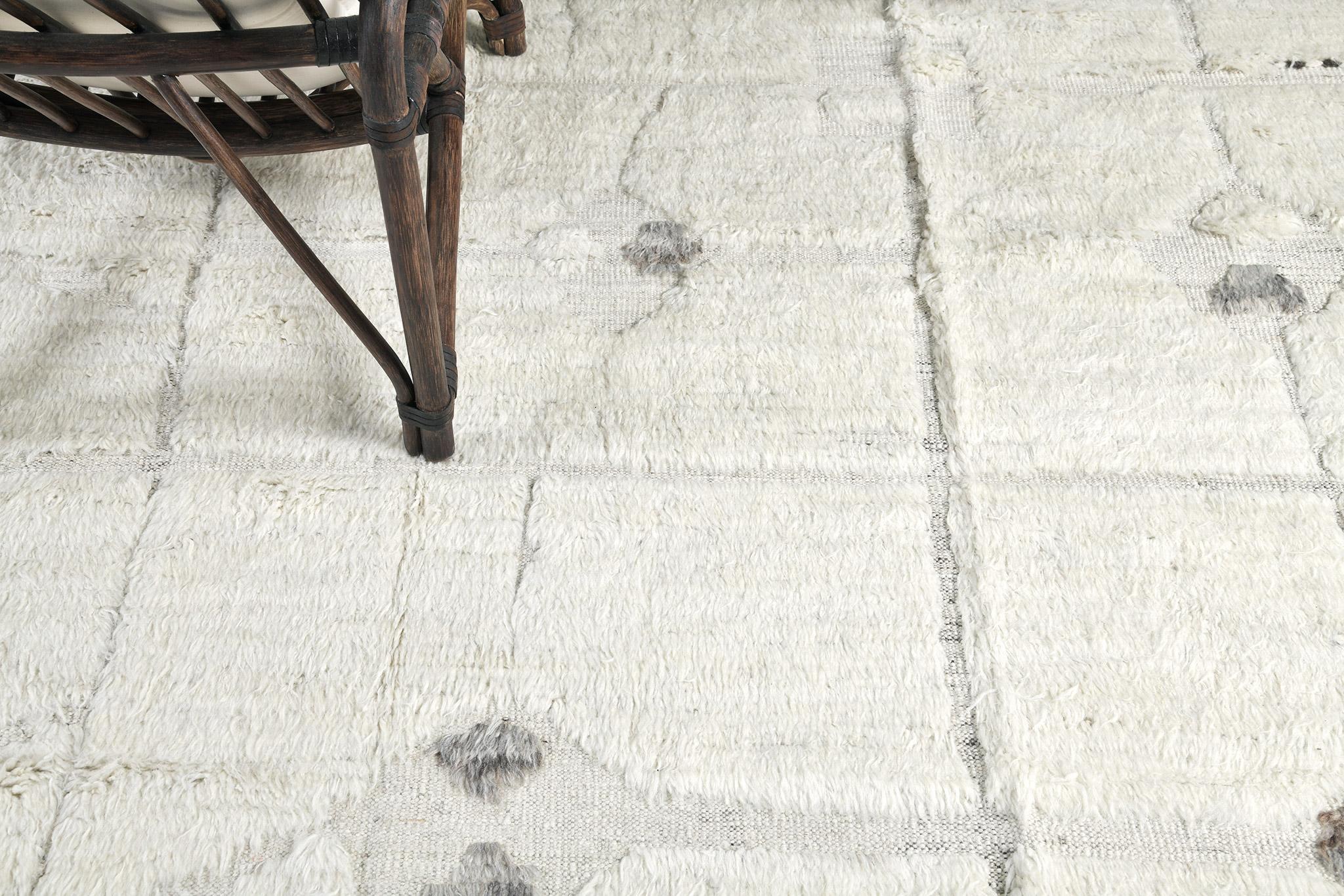 Pirouette is a mesmerizing rug that features a stunning natural color scheme displaying an array of wonderful symbolical motifs. Ivory and gray play an integral part in illuminating the rug’s overall majestic appearance. This collection, 'Kust' also