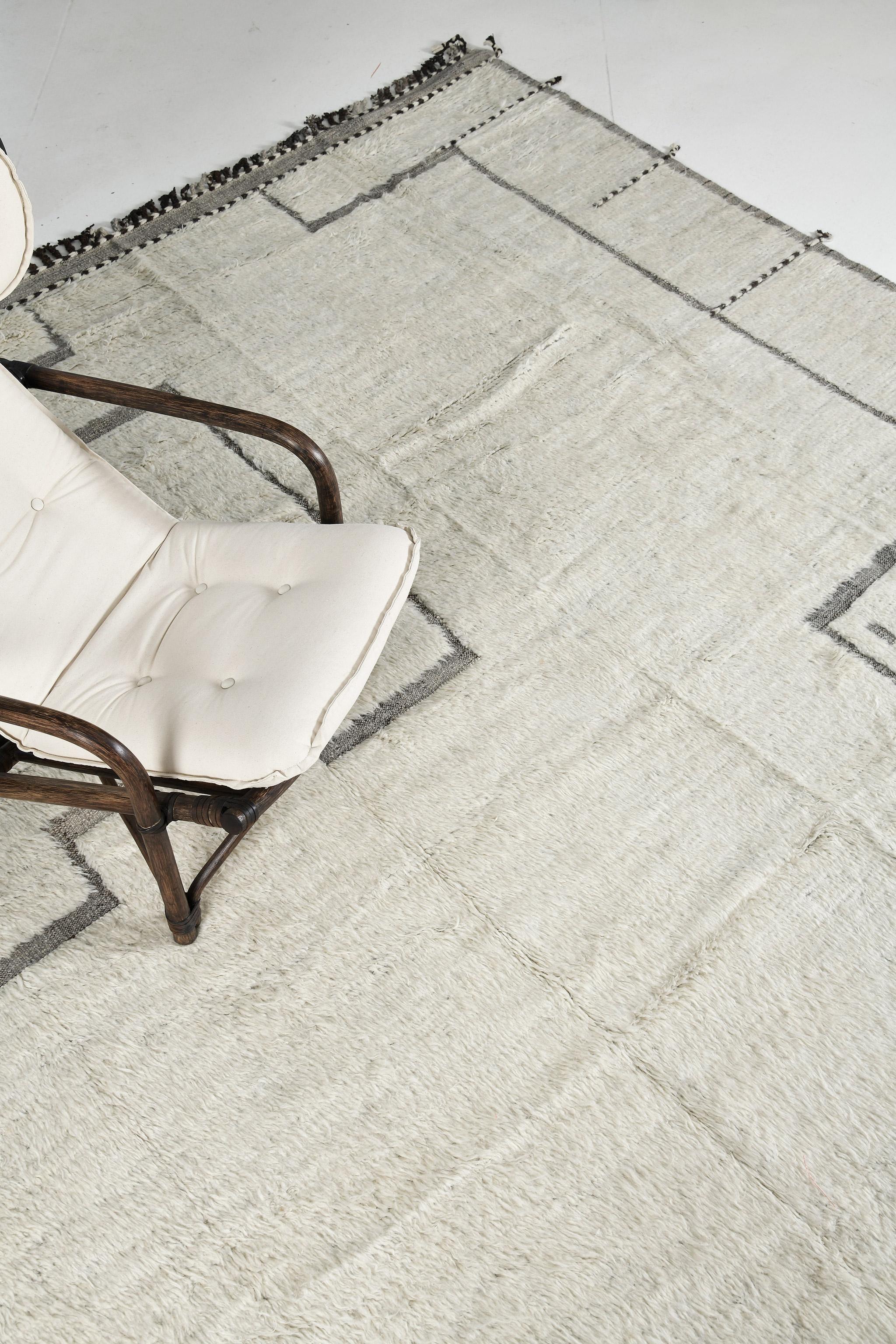 Sharqi’ features earthy toned colour palette and wonderfully soft pile. Waves of abrash movements between tranquil shades of ivory and gray give dimension and added visual interest to the understated yet impactful. This versatile transitional rug