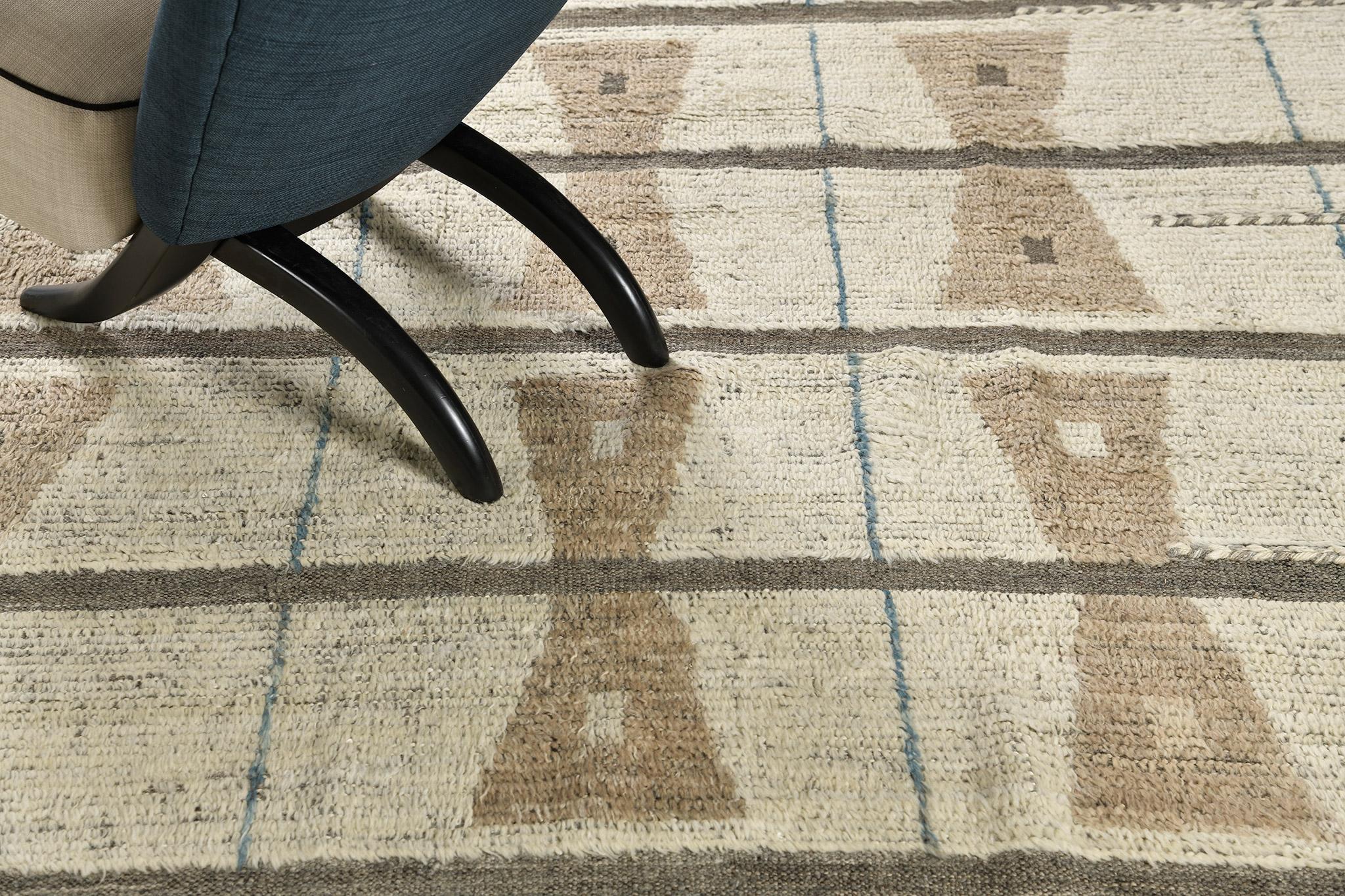 The 'Skane' rug is a handwoven wool piece inspired by vintage Scandinavian design elements and recreated for the modern design world. The repetitive grid creates balance and harmony, woven with a two-toned neutral color palette. This collection,